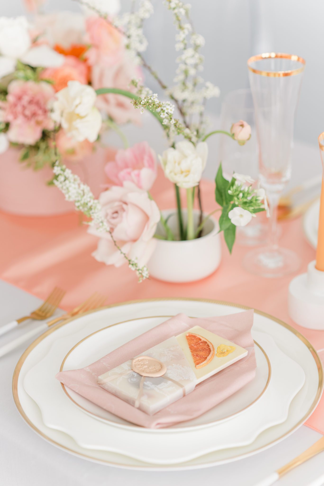modern wedding reception with pink and tangerine with dried citrus, spring wedding reception