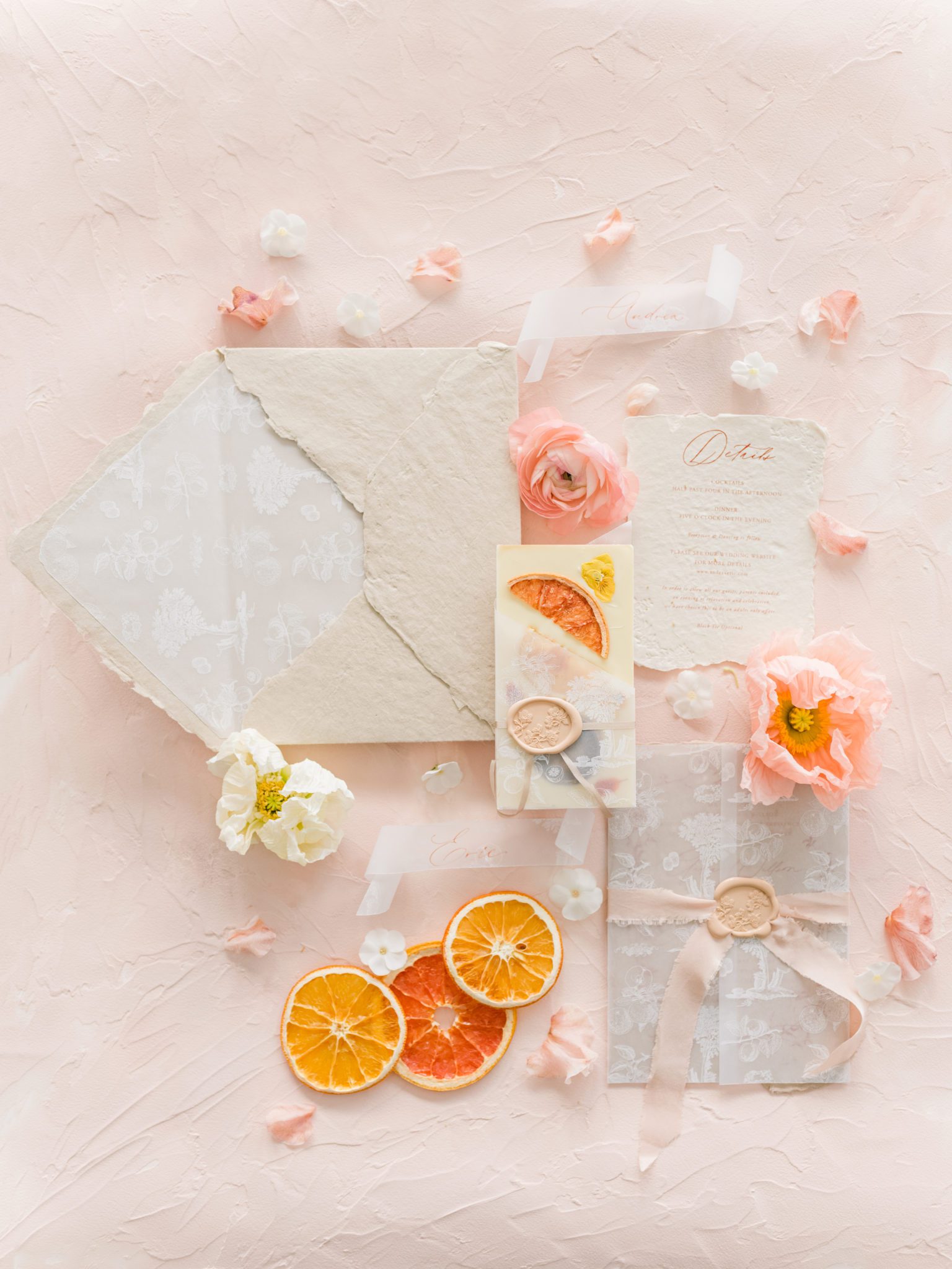 Spring colour palette with handmade invites and dried citrus. 