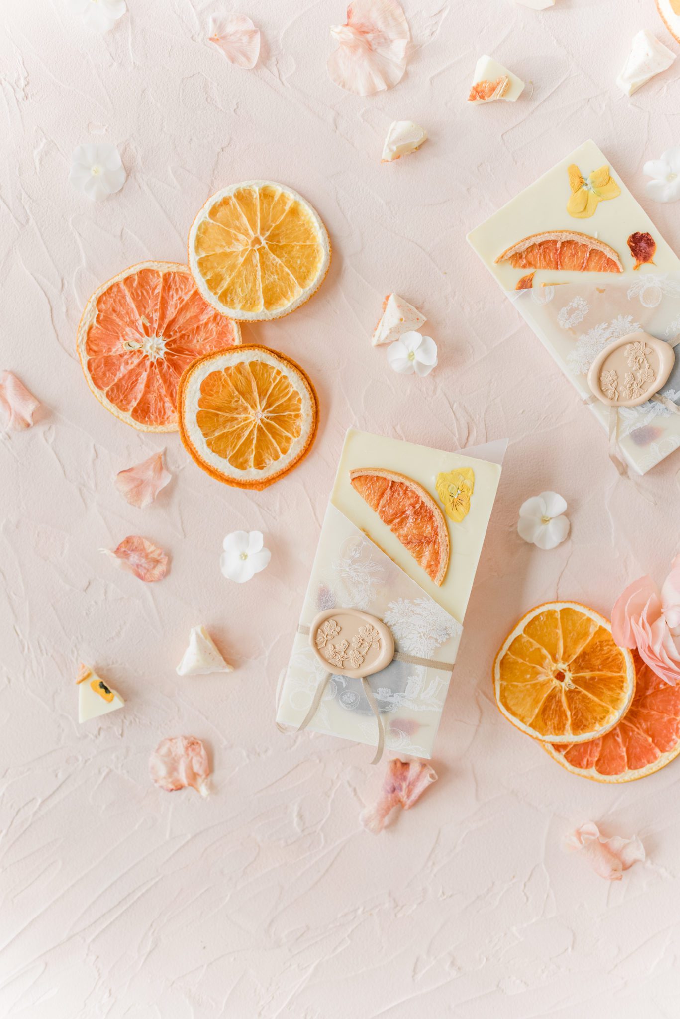 modern wedding reception with pink and tangerine, spring wedding reception, wedding flat lay with dried citrus