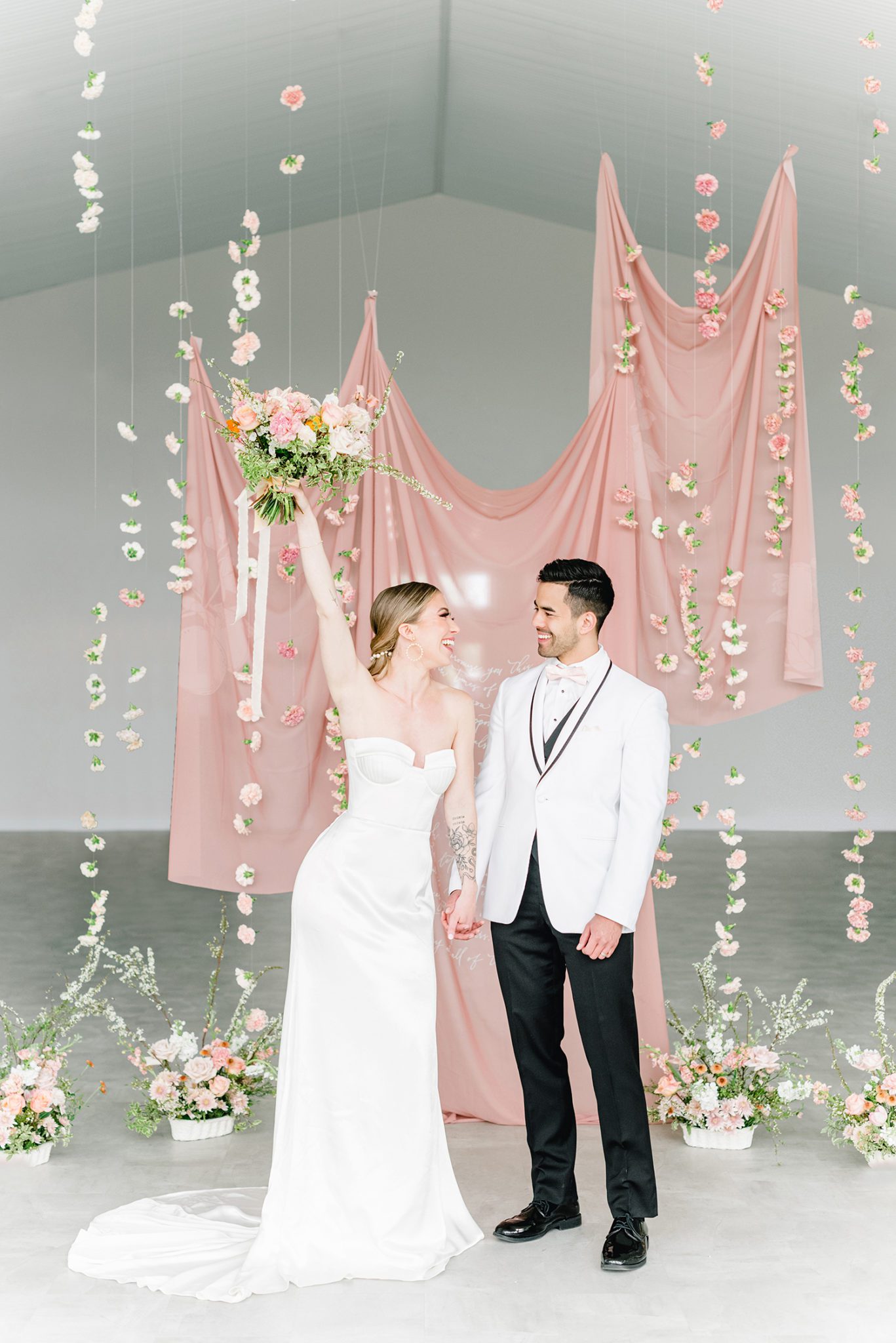 Hanging linens and floating florals for spring wedding, wedding portraits, blush and tangerine wedding bouquet, alternative ceremony space