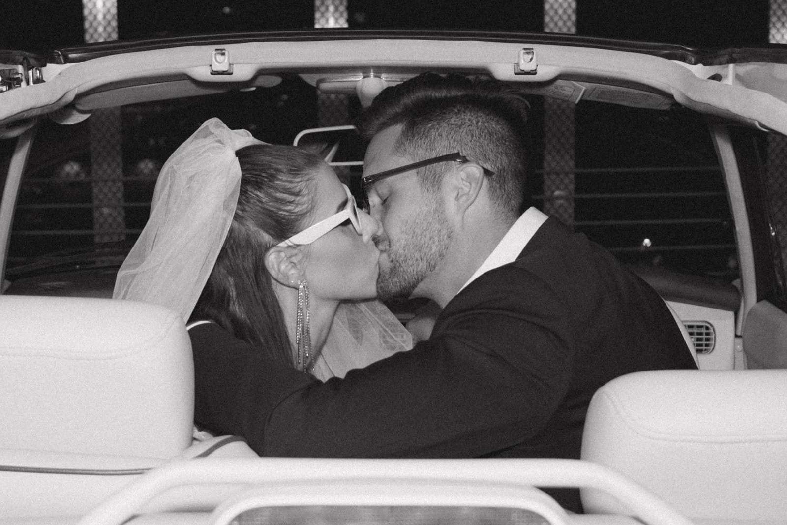 wedding kiss, black and white photography, first kiss