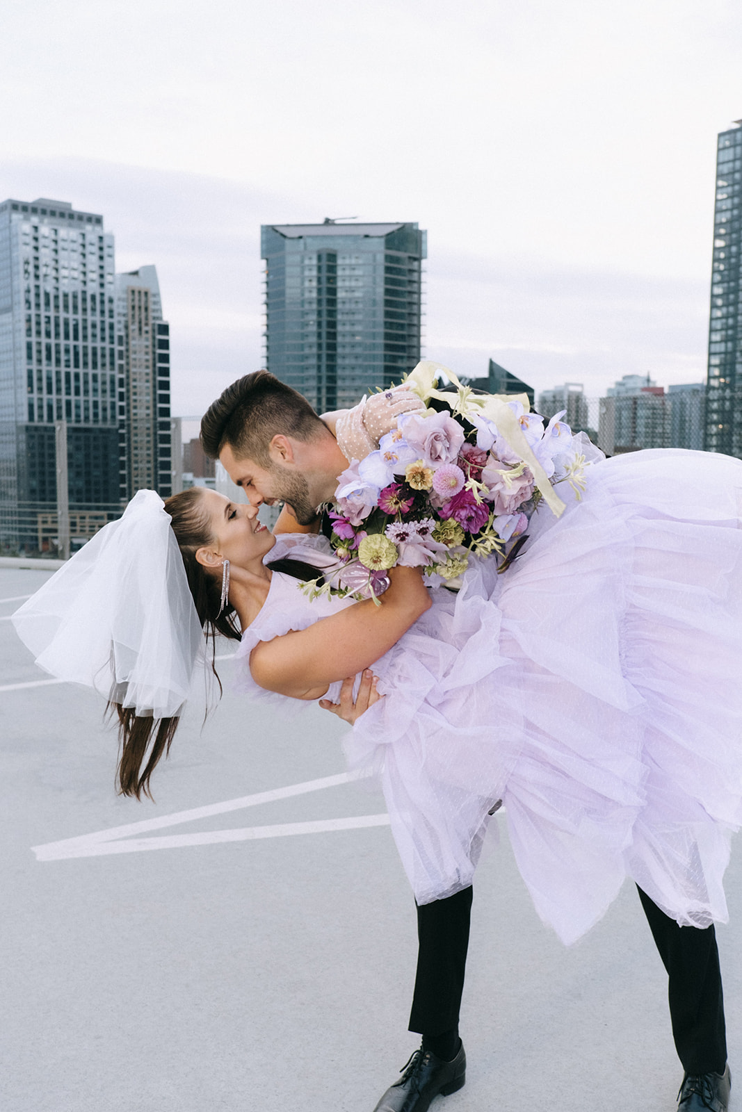 retro wedding with tulle lavender gown, parking lot elopement, downtown wedding