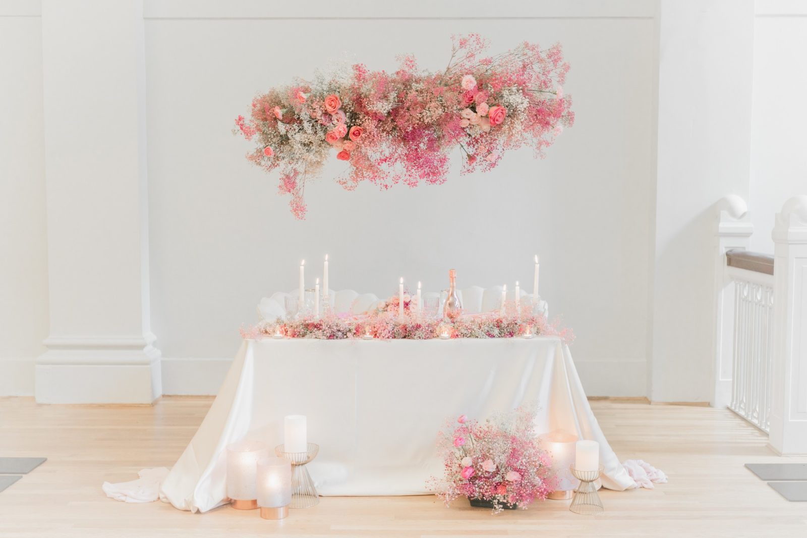 Edgy and modern pink wedding inspiration, Pink wedding floral, floating floral instalment, candle-lit wedding, sweetheart table