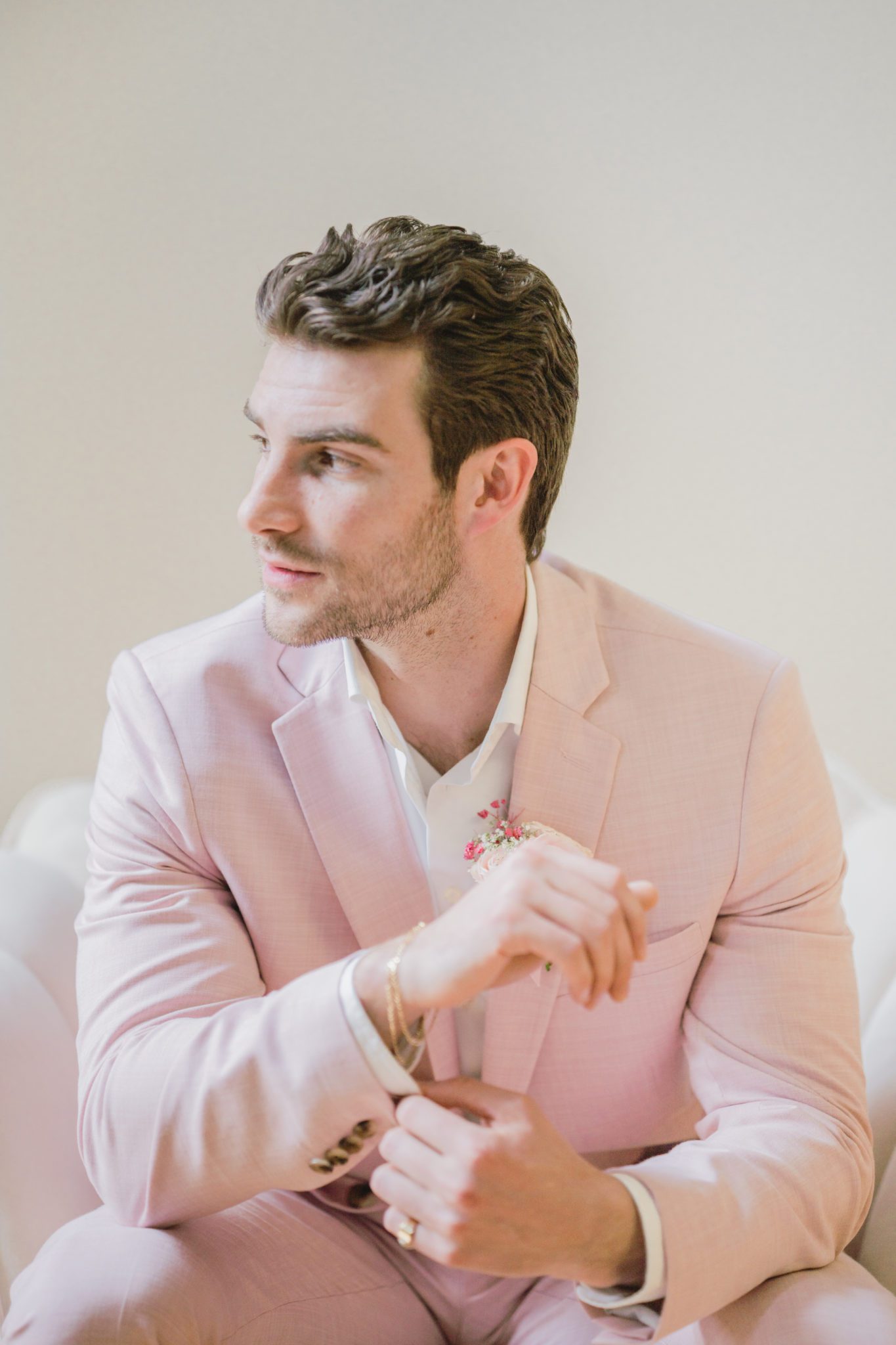 pink groom's suit, groom attire, groom portraits