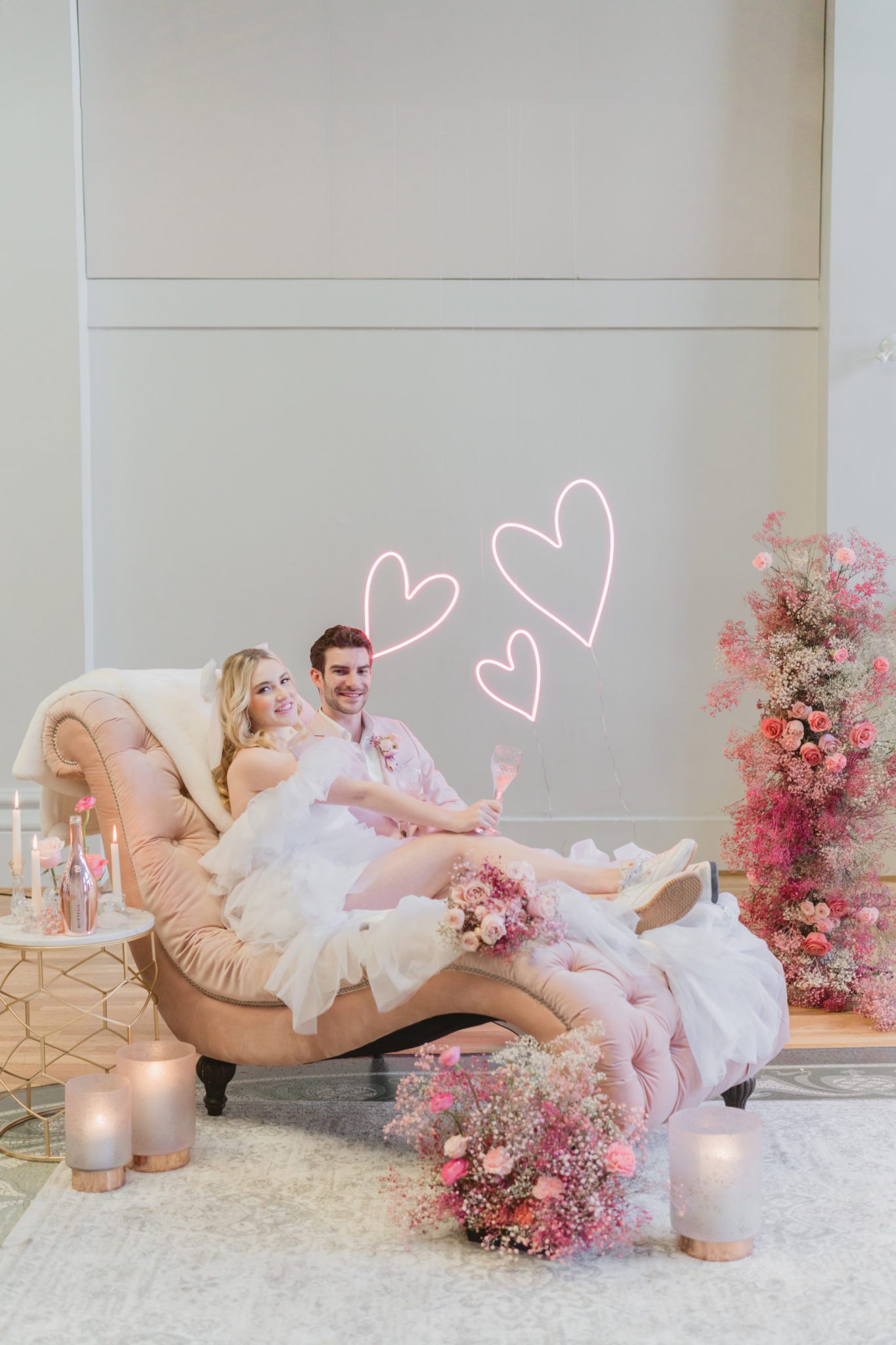 Edgy and modern pink wedding inspiration, Pink wedding floral, bridal portraits, tulle wedding gown, pink champagne, LED sign, floral wedding