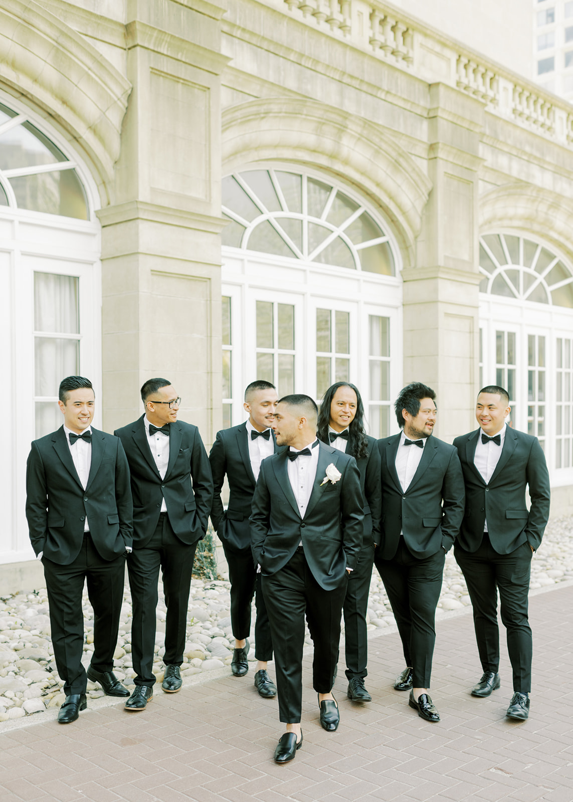groomsmen at modern outdoor wedding, bow-tie groomsmen