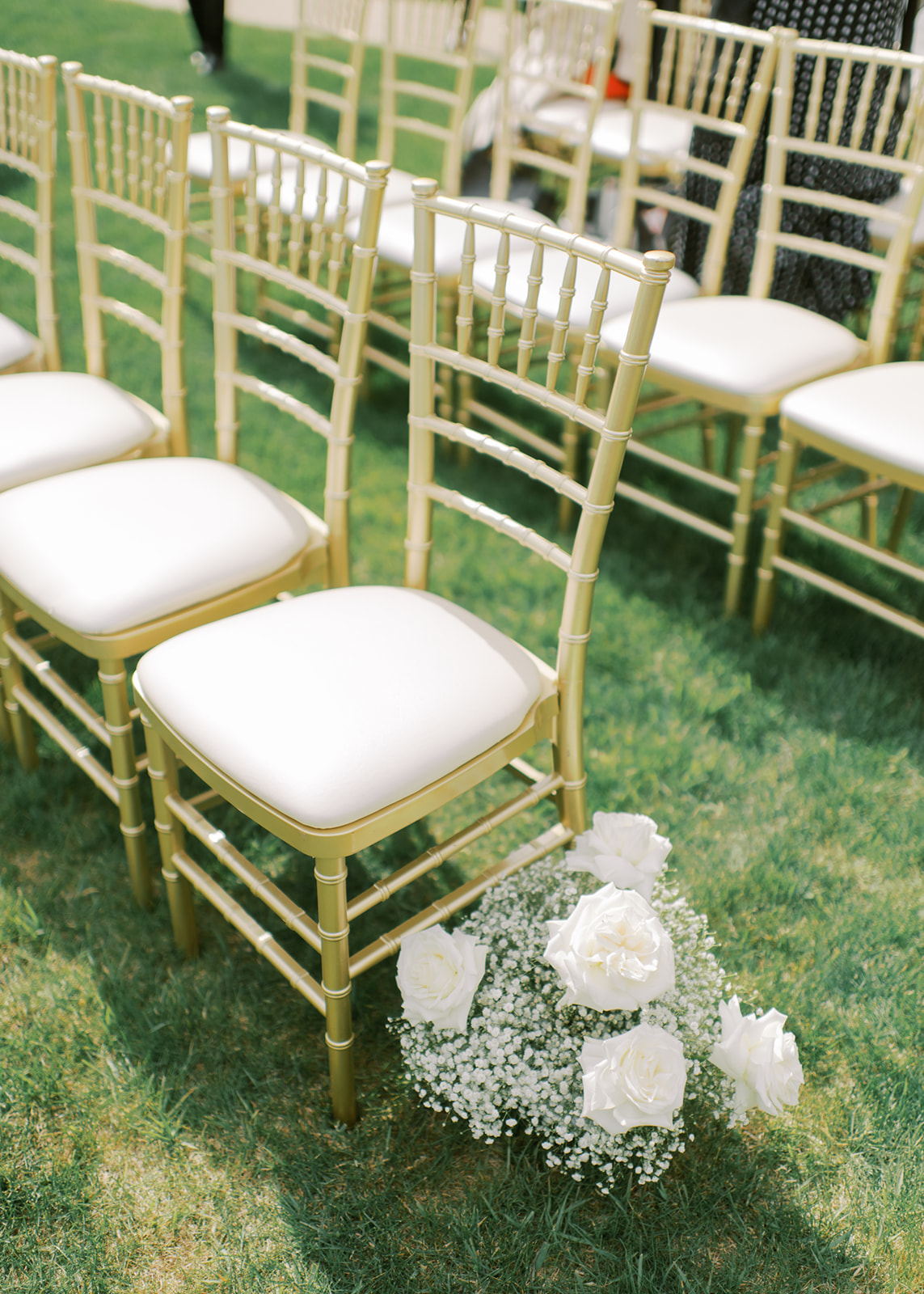 outdoor wedding ceremony, gold and white luxe wedding, white roses and baby's breath