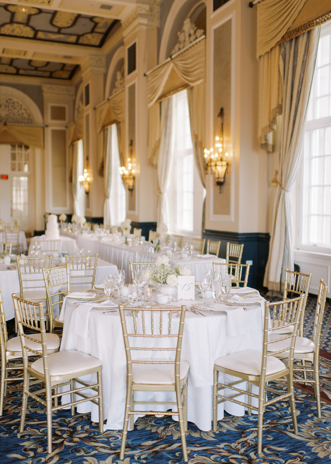 ballroom wedding with chandelier, luxe gold and white wedding, indoor ballroom reception