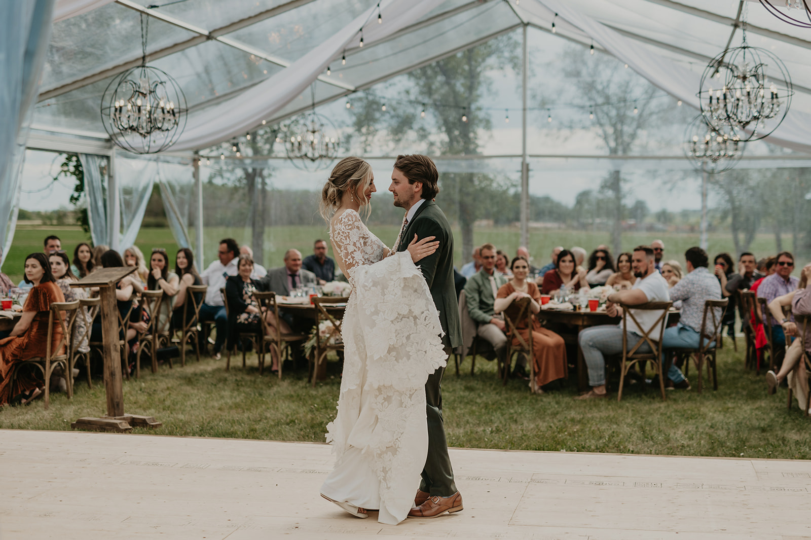 tented backyard wedding, reception for outdoor fall wedding, first dance at wedding