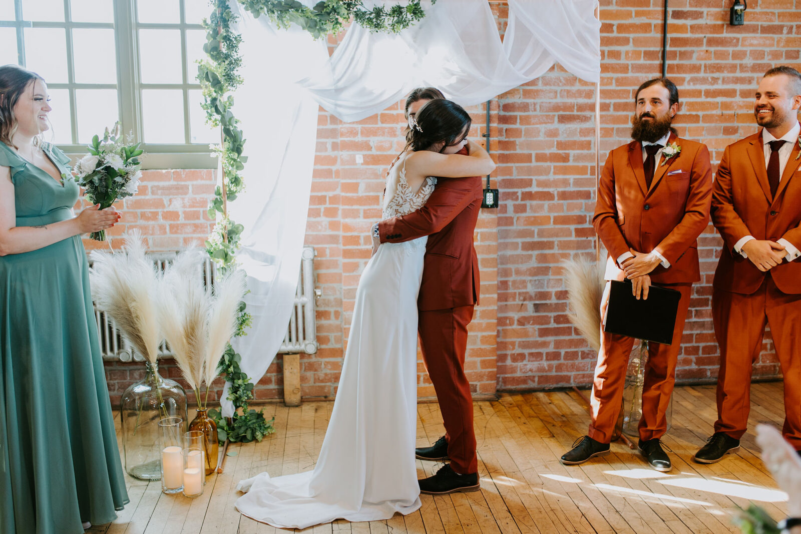 intimate and sentimental fall wedding ceremony, green and terracotta real wedding in Calgary at Char Bar restaurant