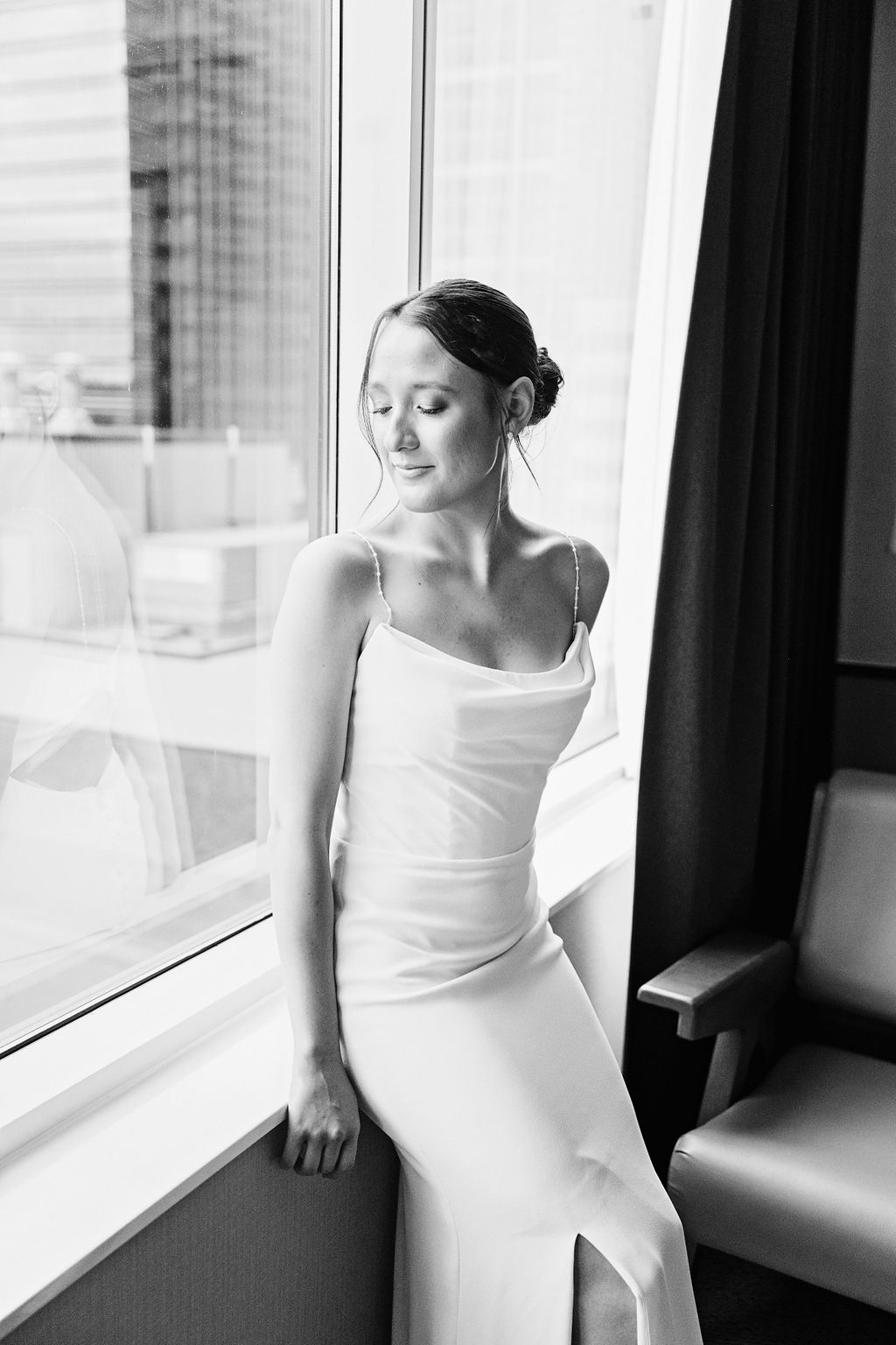 bride getting ready for wedding, black and white wedding portraits