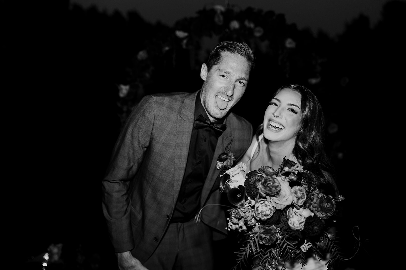 Black and white wedding photographs for fun couples. Evening outdoor reception photography