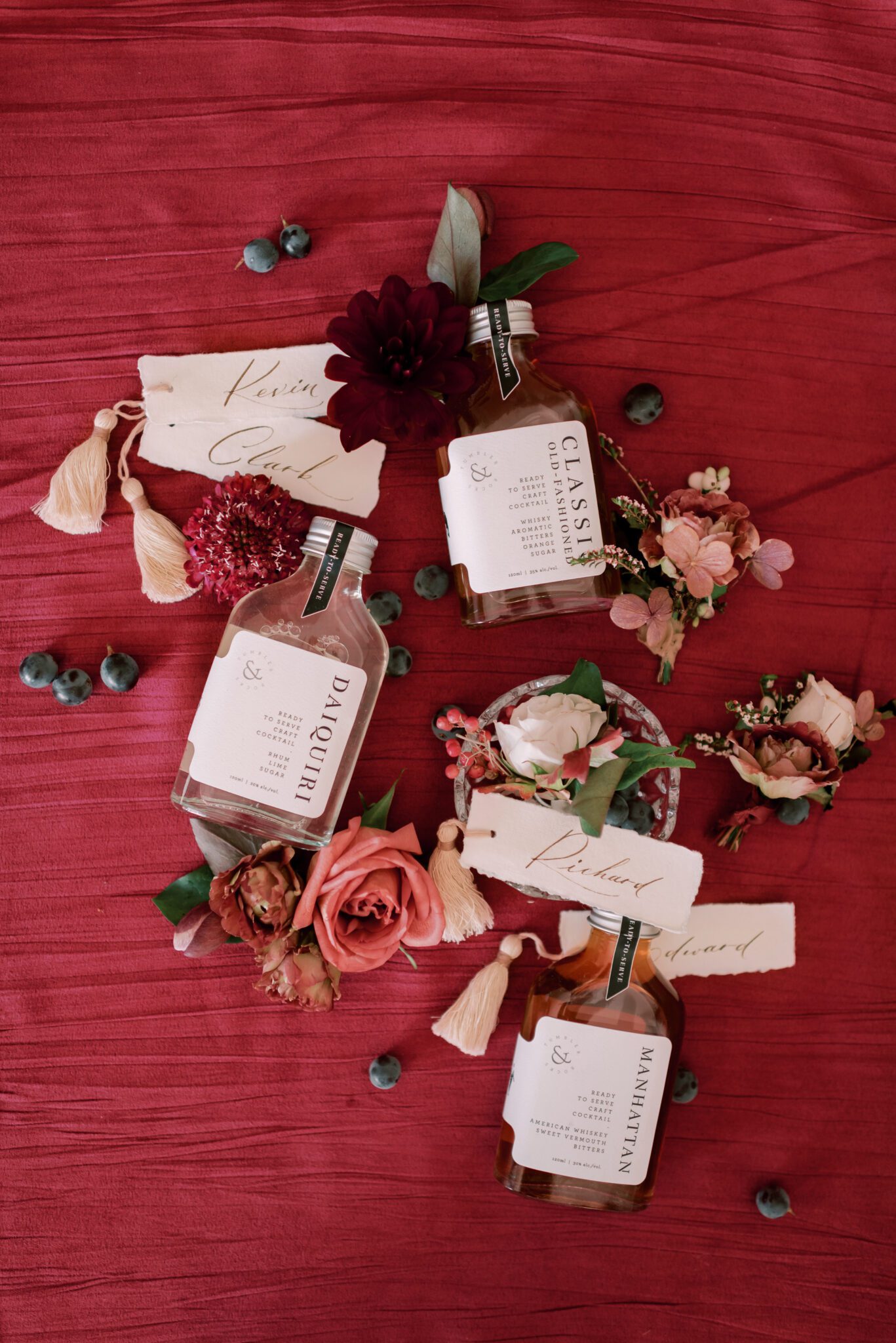 fall floral inspiration in burgundy, red, and berry, custom cocktails by Tumbler and Rocks, custom stationery by Paperocelot