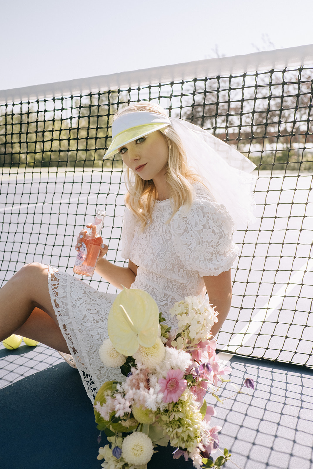 sporty bridal style, Short bridal veil and lululemon yellow tennis visor in this sporty bridal inspiration, spring and summer casual wedding inspiration and ideas