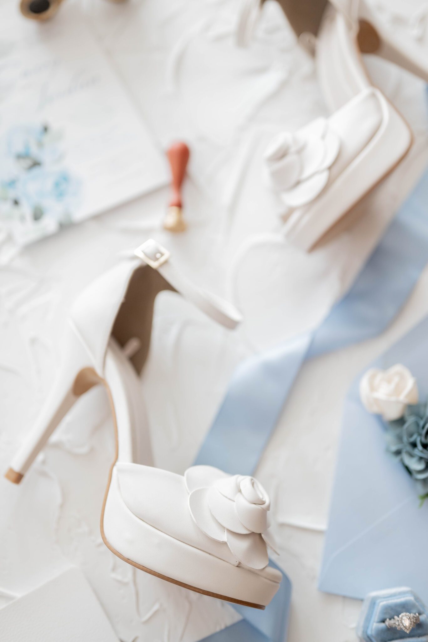 retro white leather bridal heels with large flower on the open toed pump, wedding detail photo inspiration 