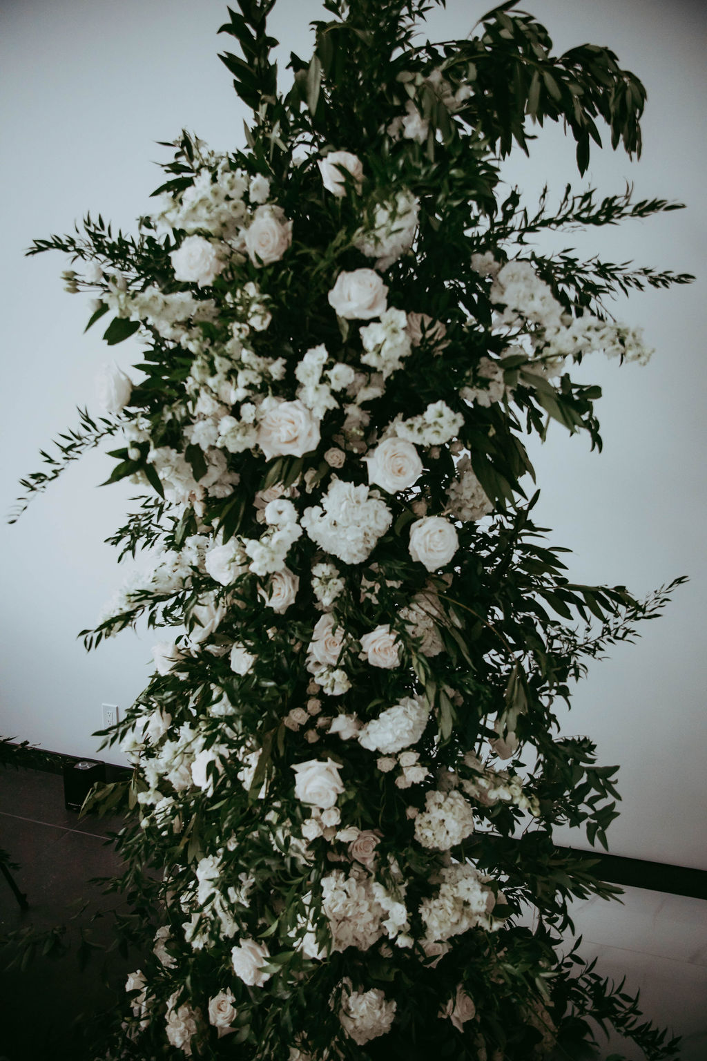 Modern white florals with added greenery for Red Deer glam wedding. 