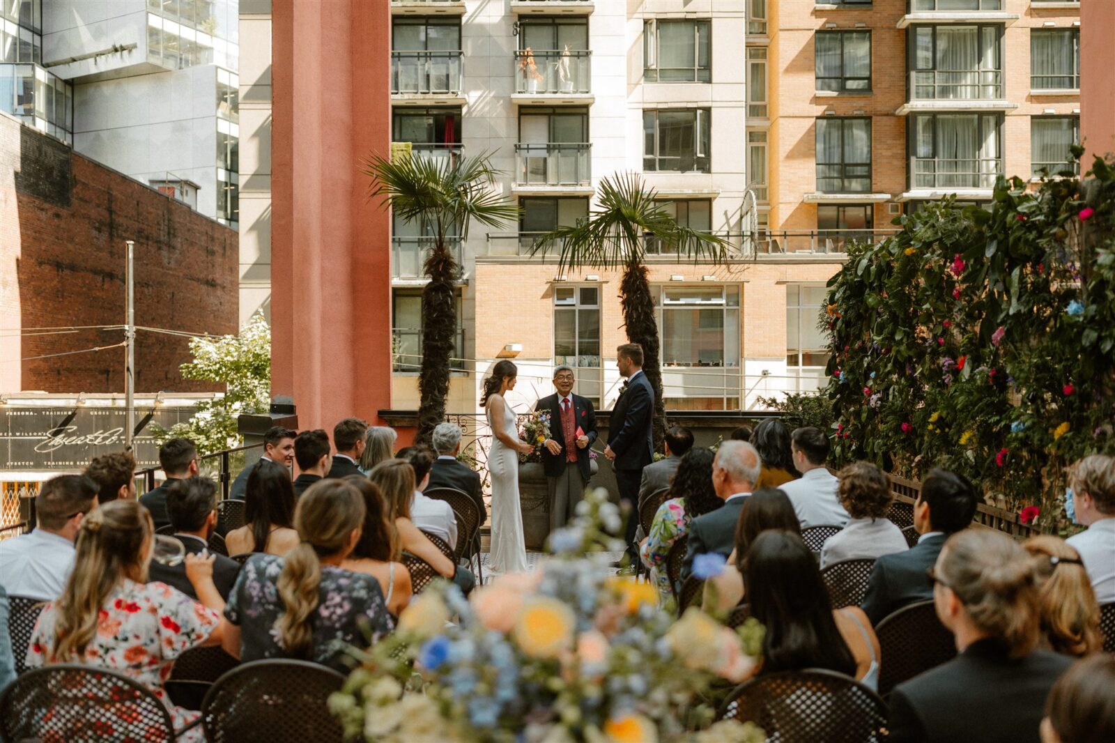 Urban rooftop wedding ceremony at Fable Diner and Bar in downtown Vancouver, captured by Abigail Eveline Photography.