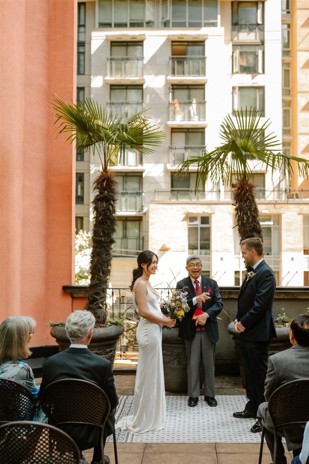 Urban rooftop wedding ceremony at Fable Diner and Bar in downtown Vancouver, captured by Abigail Eveline Photography.