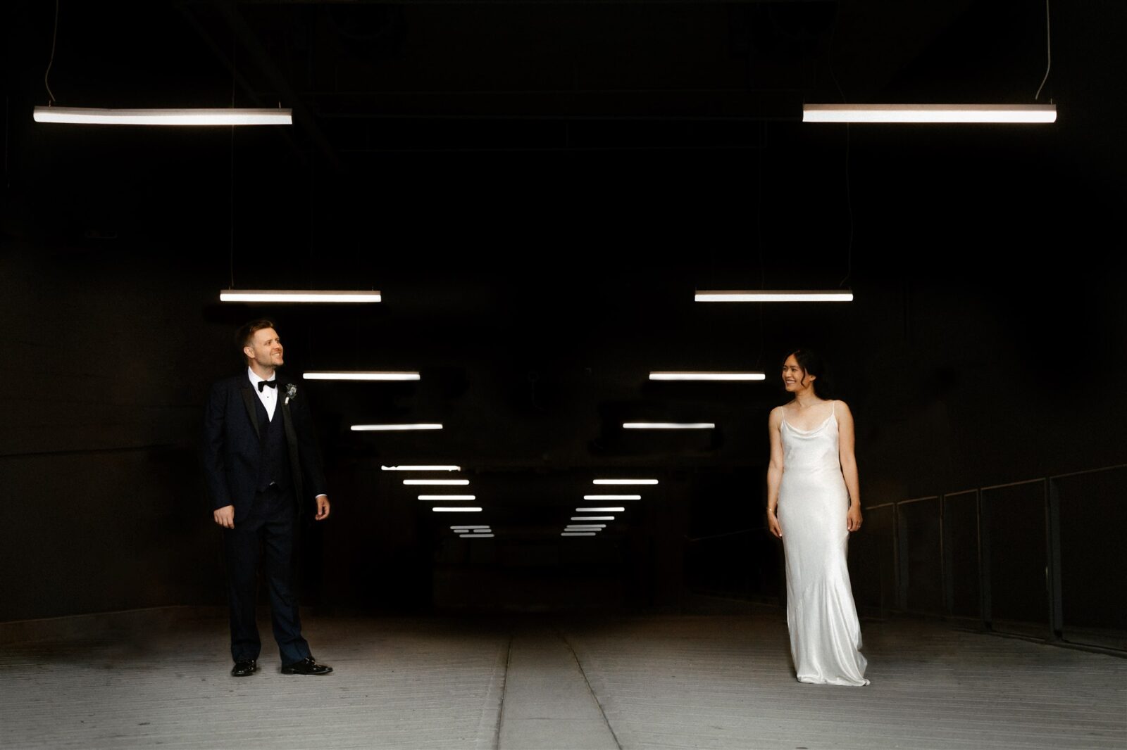 Downtown Vancouver wedding inspiration. Bride wearing sleek satin bridal gown from Park and Fifth. 