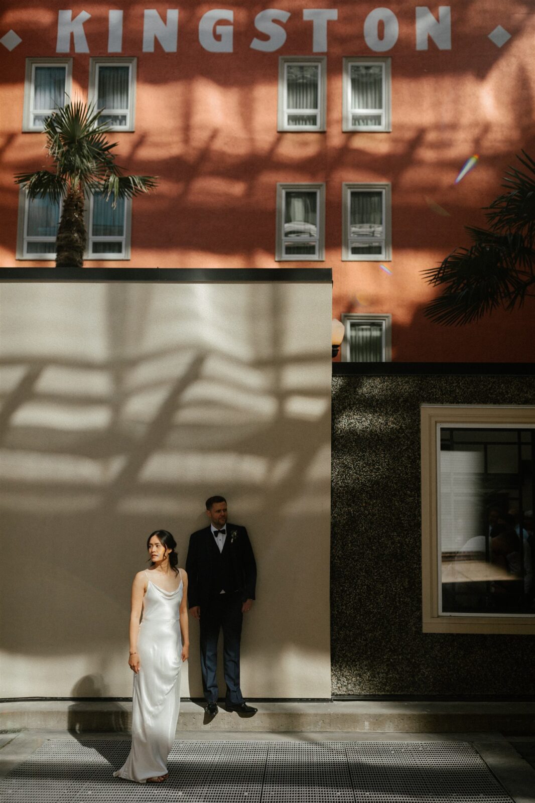Downtown Vancouver summer wedding inspiration. Bride wearing sleek satin bridal gown from Park and Fifth. 