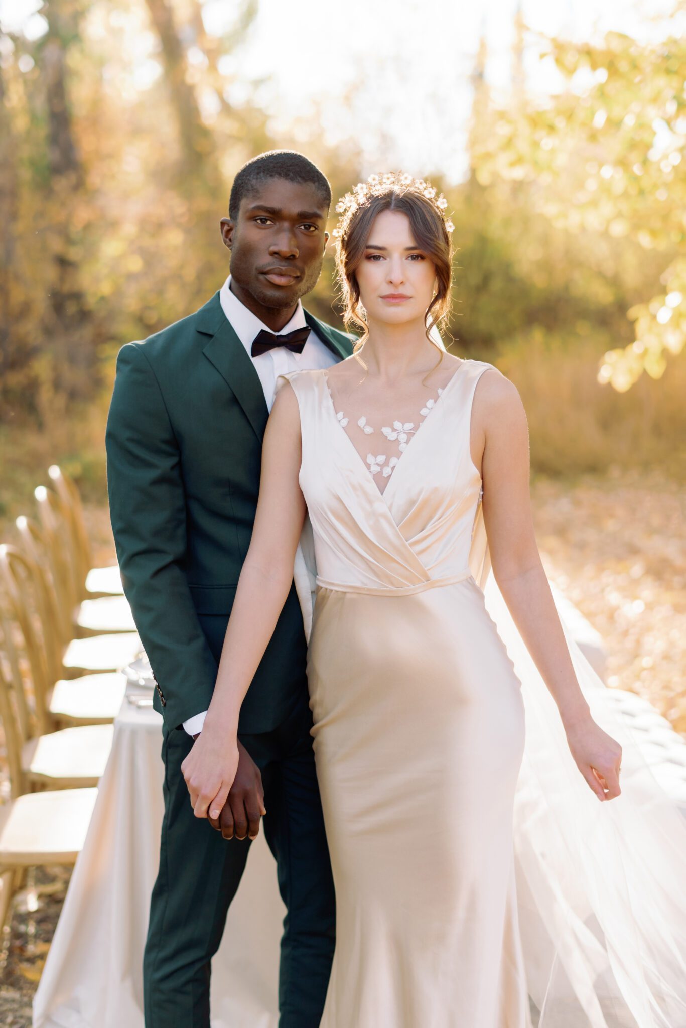 Fine art wedding photography by Kaity Body. Intimate Autumn Wedding featuring emerald green suit and champagne satin bridal gown with lace detail. 