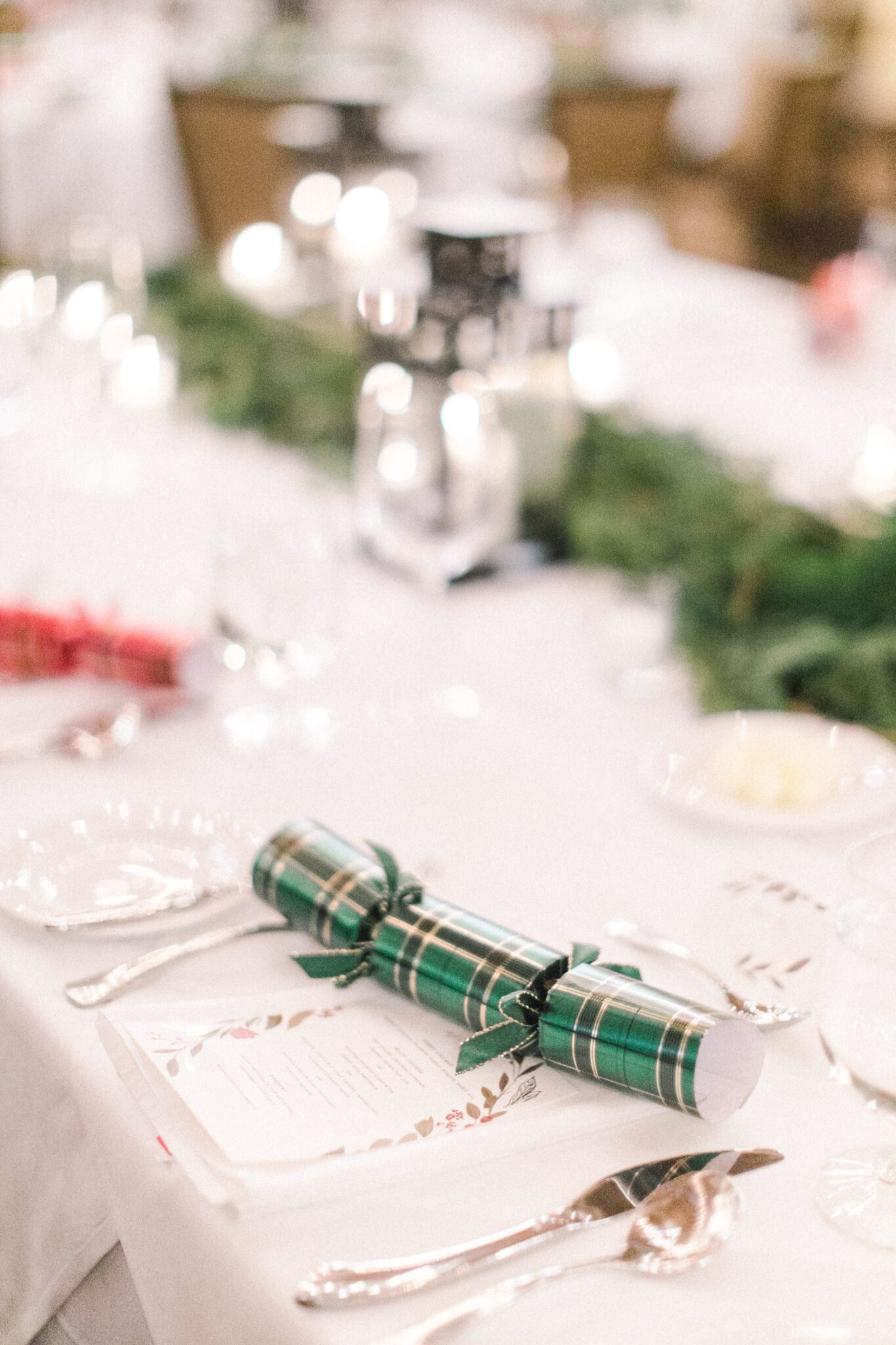 Winter wedding tablescape at Silvertip Resort, with patterned wedding favours, bright table decor, winter wedding inspiration. 