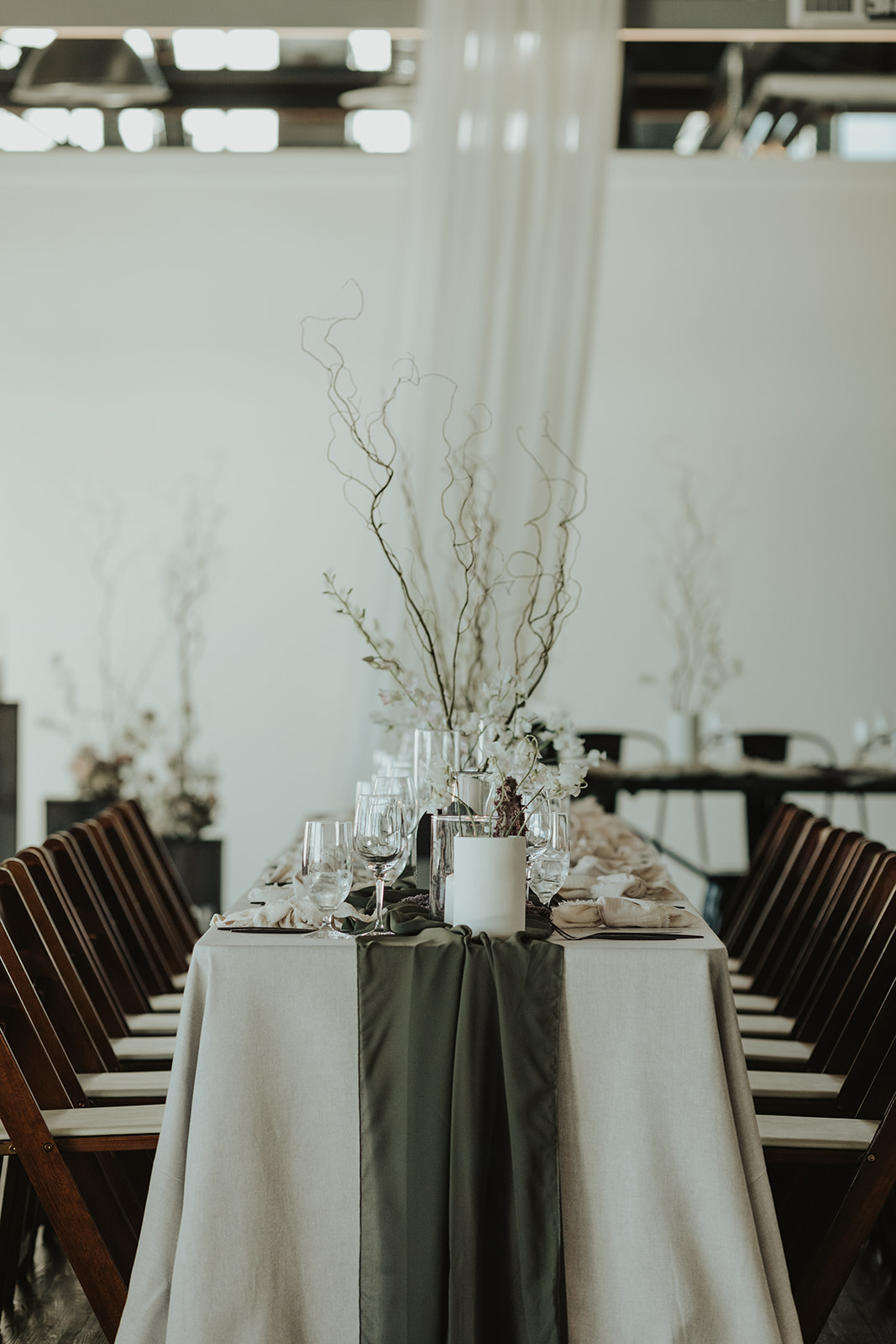 Gorgeous reception at The Wallace in North Vancouver. Decorated with olive green table runners, and earthy, organic florals. Decor rentals by Bespoke Decor.