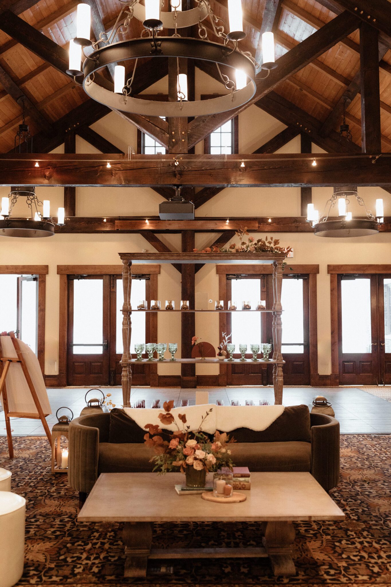 Warm, moody photography style at Silvertip Resort, featuring a cozy lounge area for guests to enjoy, winter wedding inspiration. 