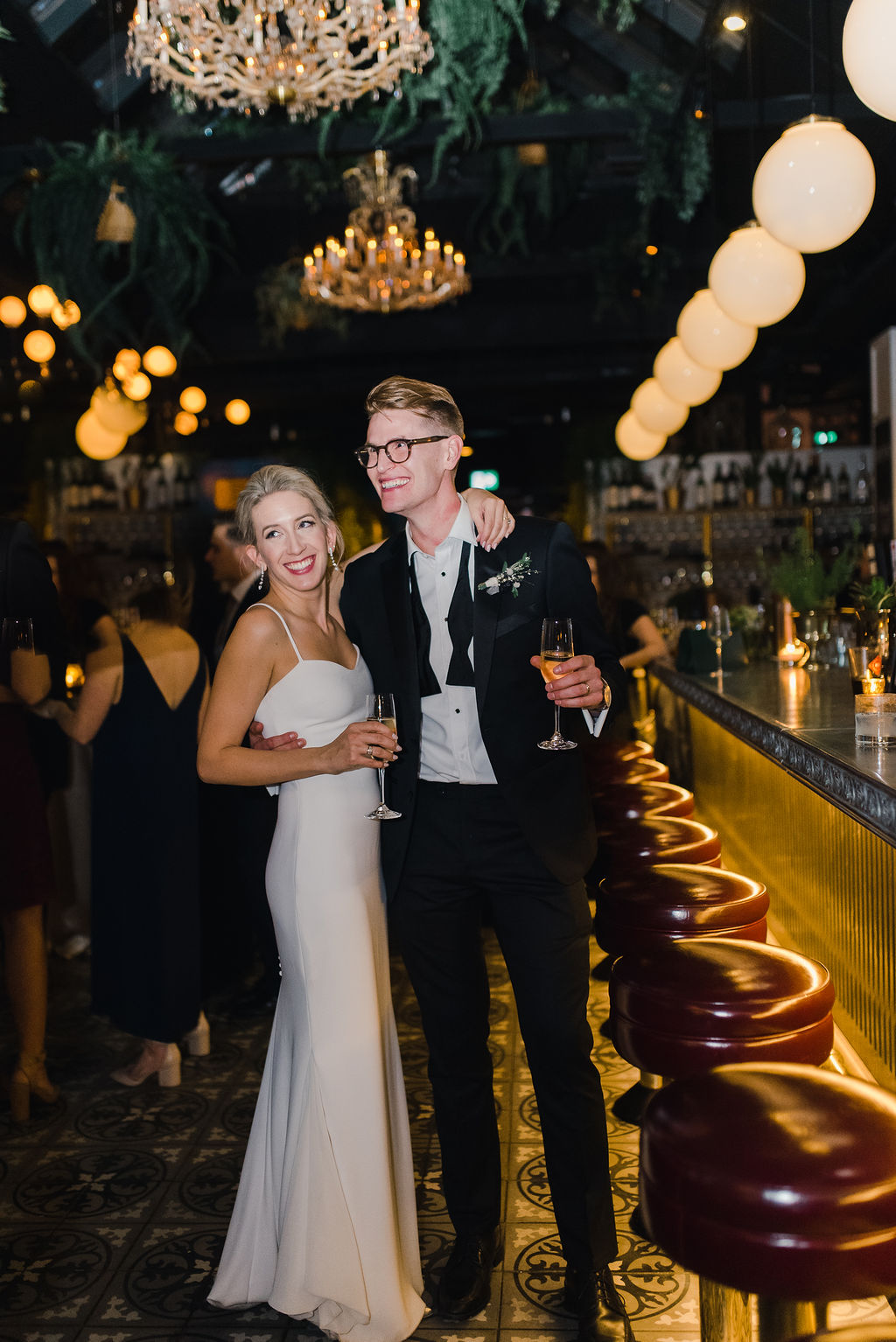 Portrait of bride and groom in Royale venue at their wedding reception, flash photo inspiration, winter wedding inspiration. 