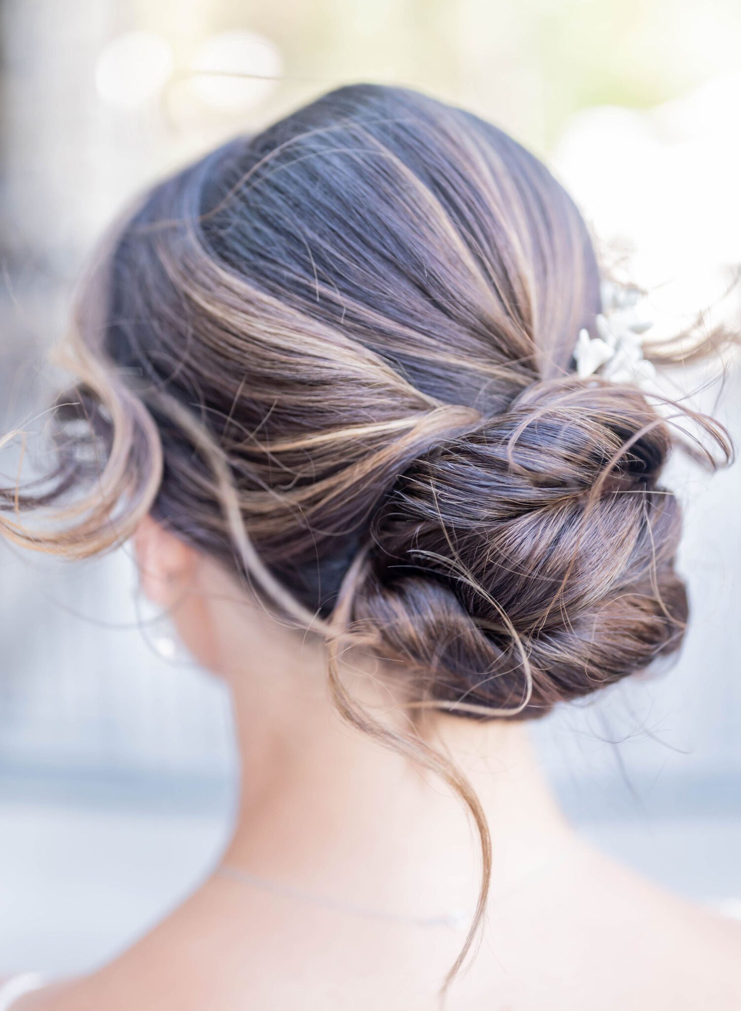 Elegant updo hairstyle for classy wedding style at the Fairmont Banff Springs. 