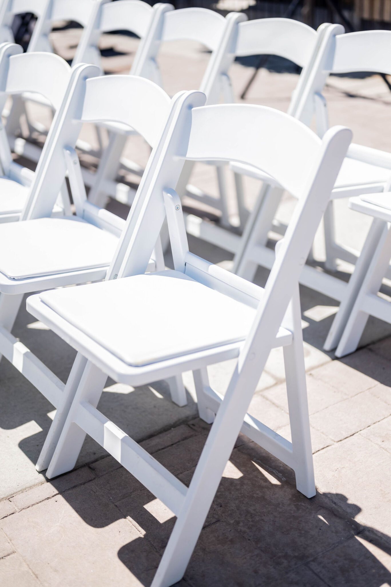 White chairs at Fairmont Banff Springs summer wedding. 