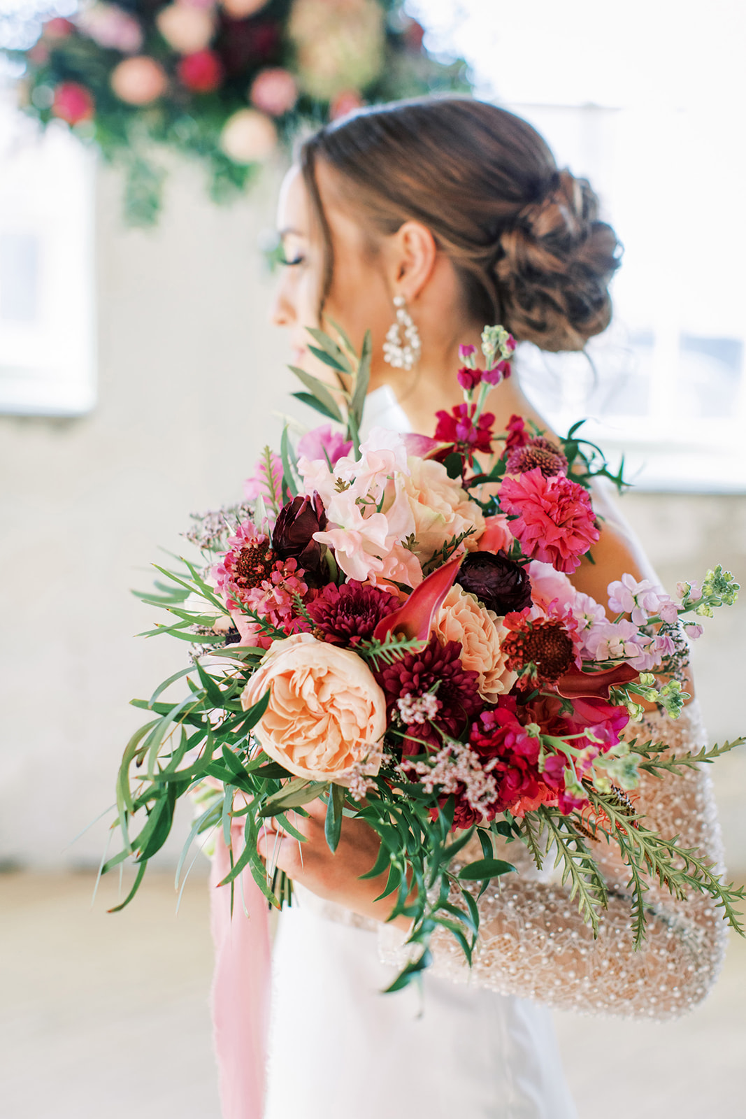 Stunning bridal portrait inspiration, featuring large colourful pink bouquet created by Rose & Vine. 