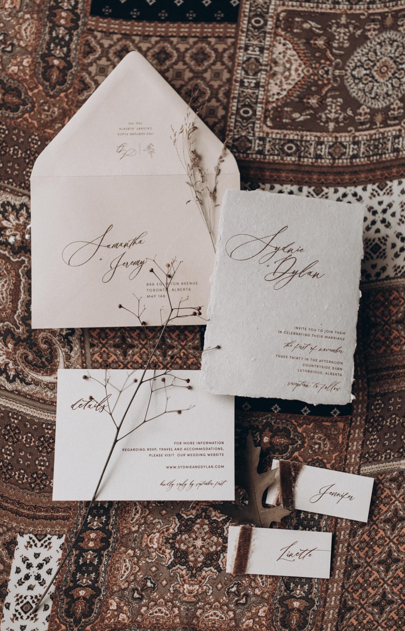Neutral romantic wedding invitation suite with handmade paper and brown velvet ribbon. Designed by Pink Umbrella Invitations. Vintage decor meets country chic style in this Alberta wedding inspiration
