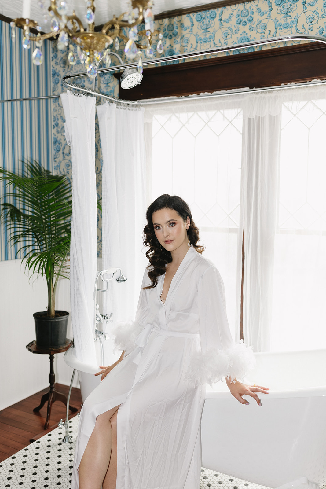 Chic Bridal Inspiration & Getting Ready Photos Perfect for the Fashion-Forward Bride. Bride wearing feather lined robe.