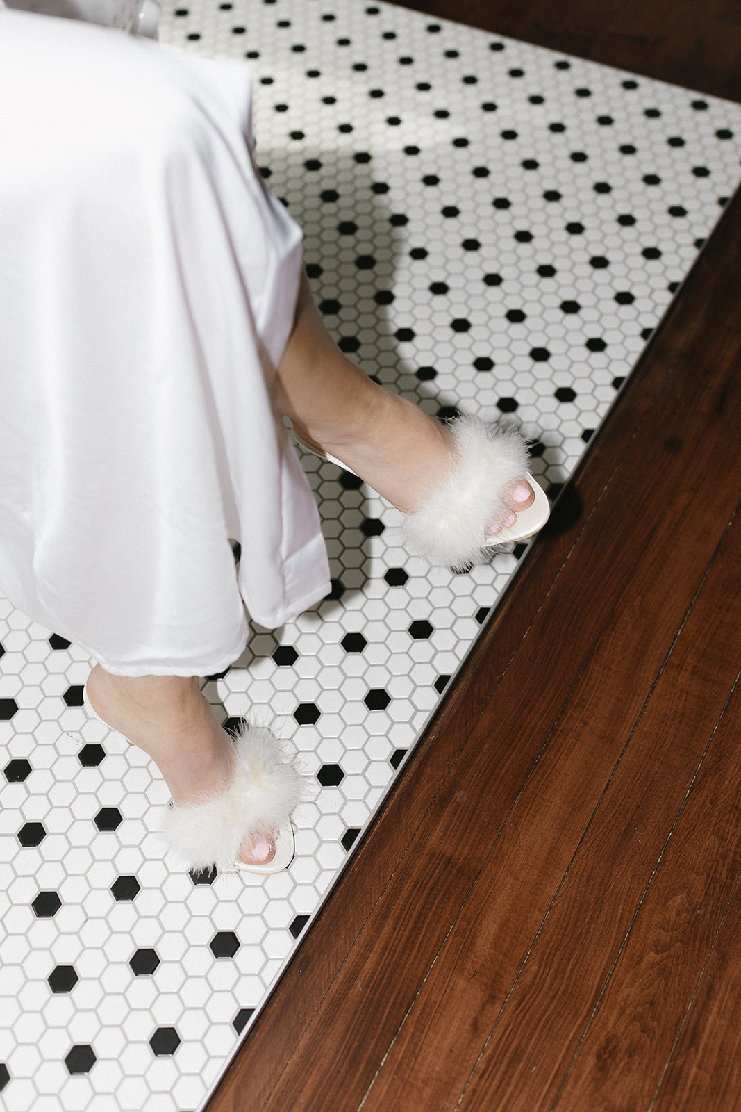 Chic Bridal Inspiration & Getting Ready Photos Perfect for the Fashion-Forward Bride. Bride wearing feather heals by Ereybe Wedding Shoes.