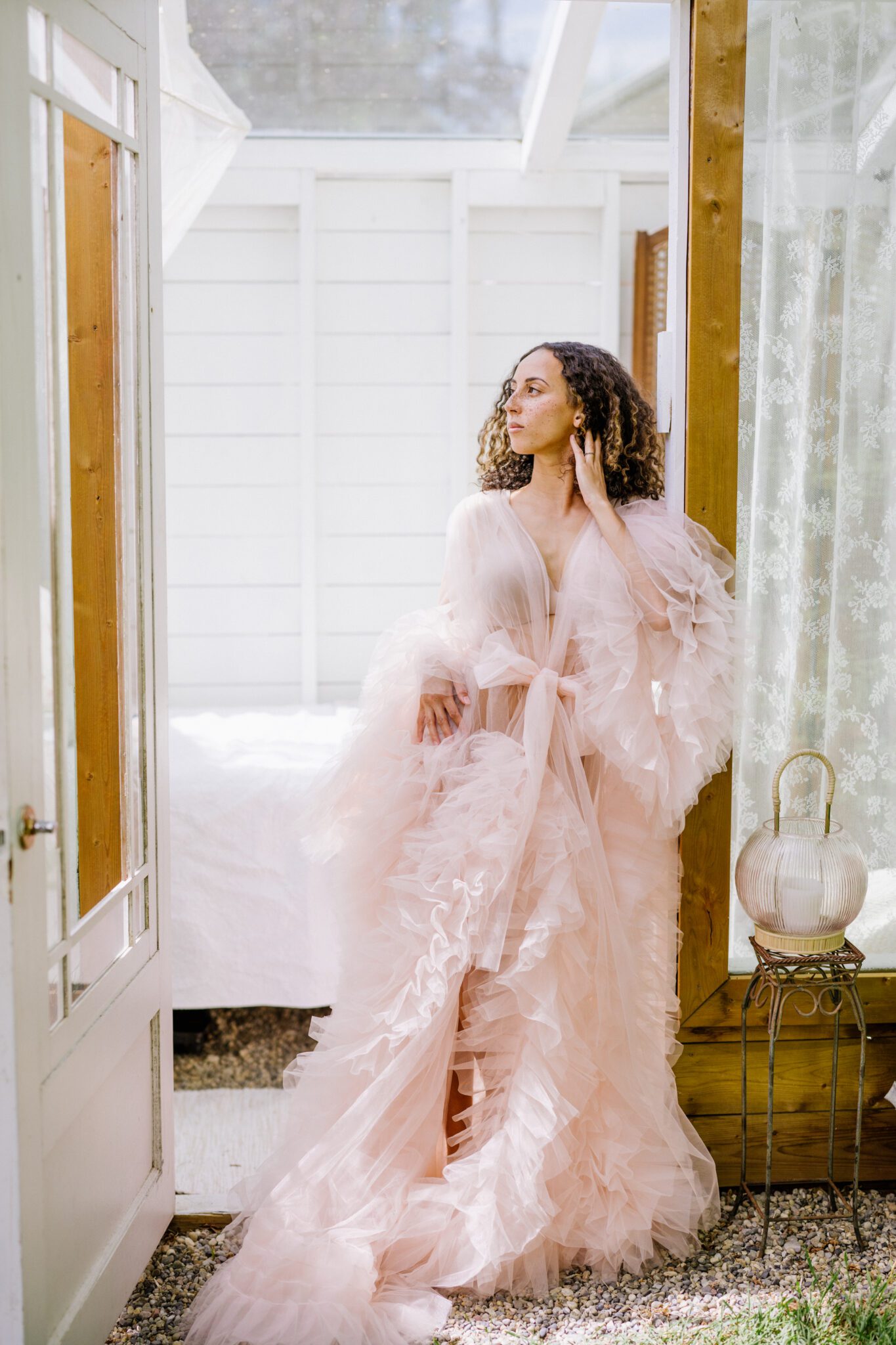 Fine art boudoir photography featuring feminine tulle blush old Hollywood ruffled robe, romantic bridal portrait by Christy D Swanberg, spring floral bridal boudoir inspiration, bridal boudoir advice
