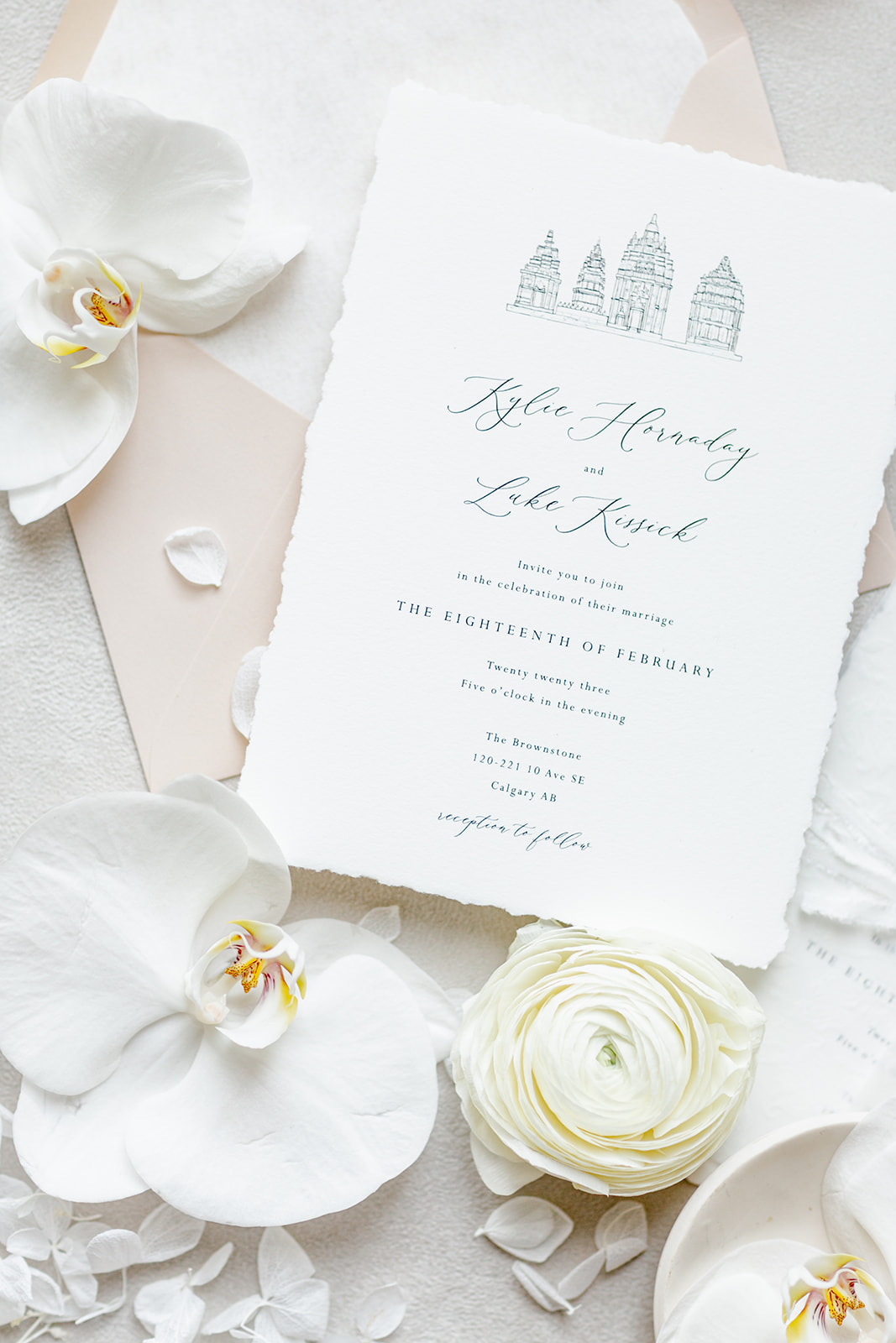 Elegant white wedding invitation paper suite by Pink Umbrella Invites. 