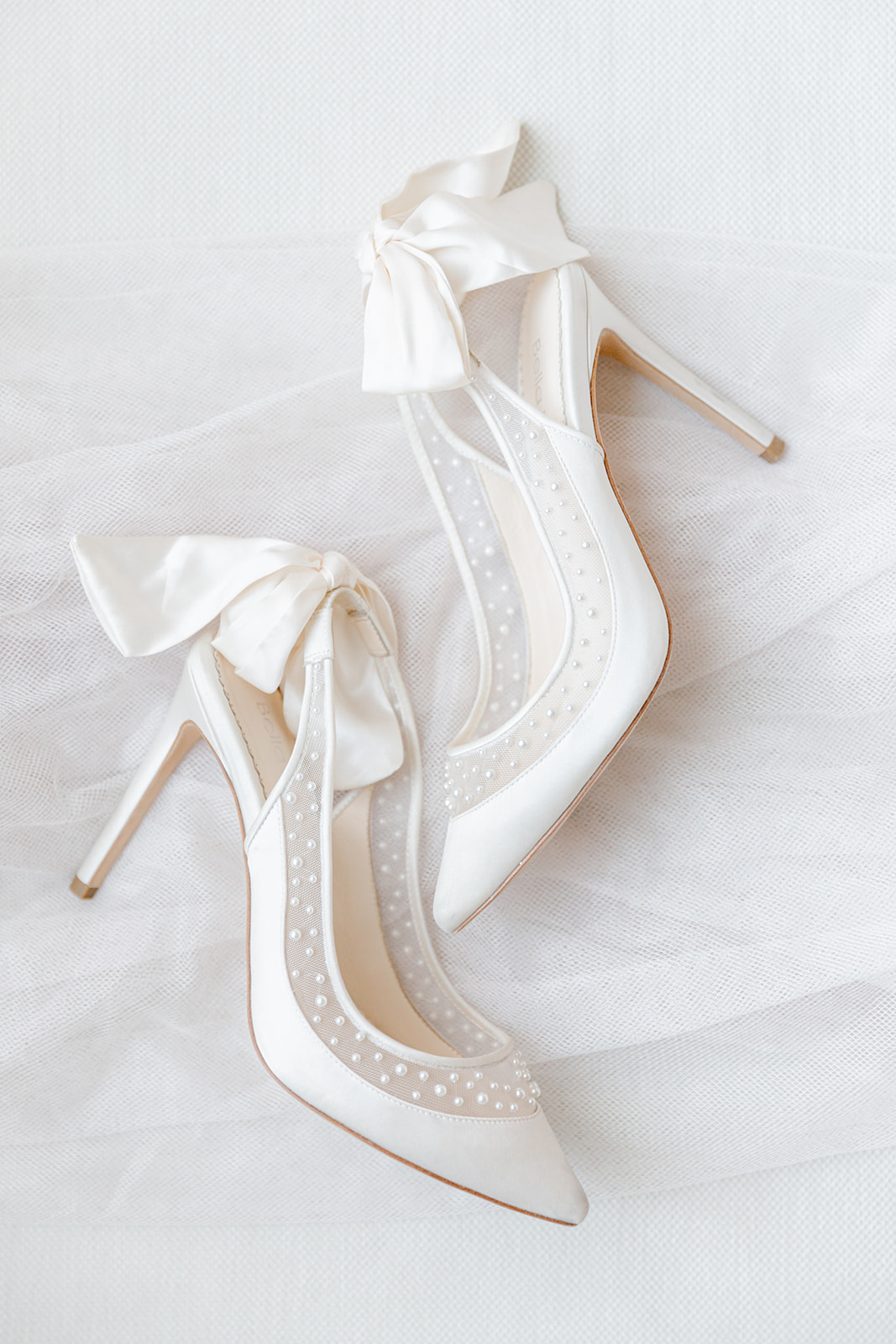 Elegant bridal shoes with bow detail strap designed by Bella Belle Shoes.