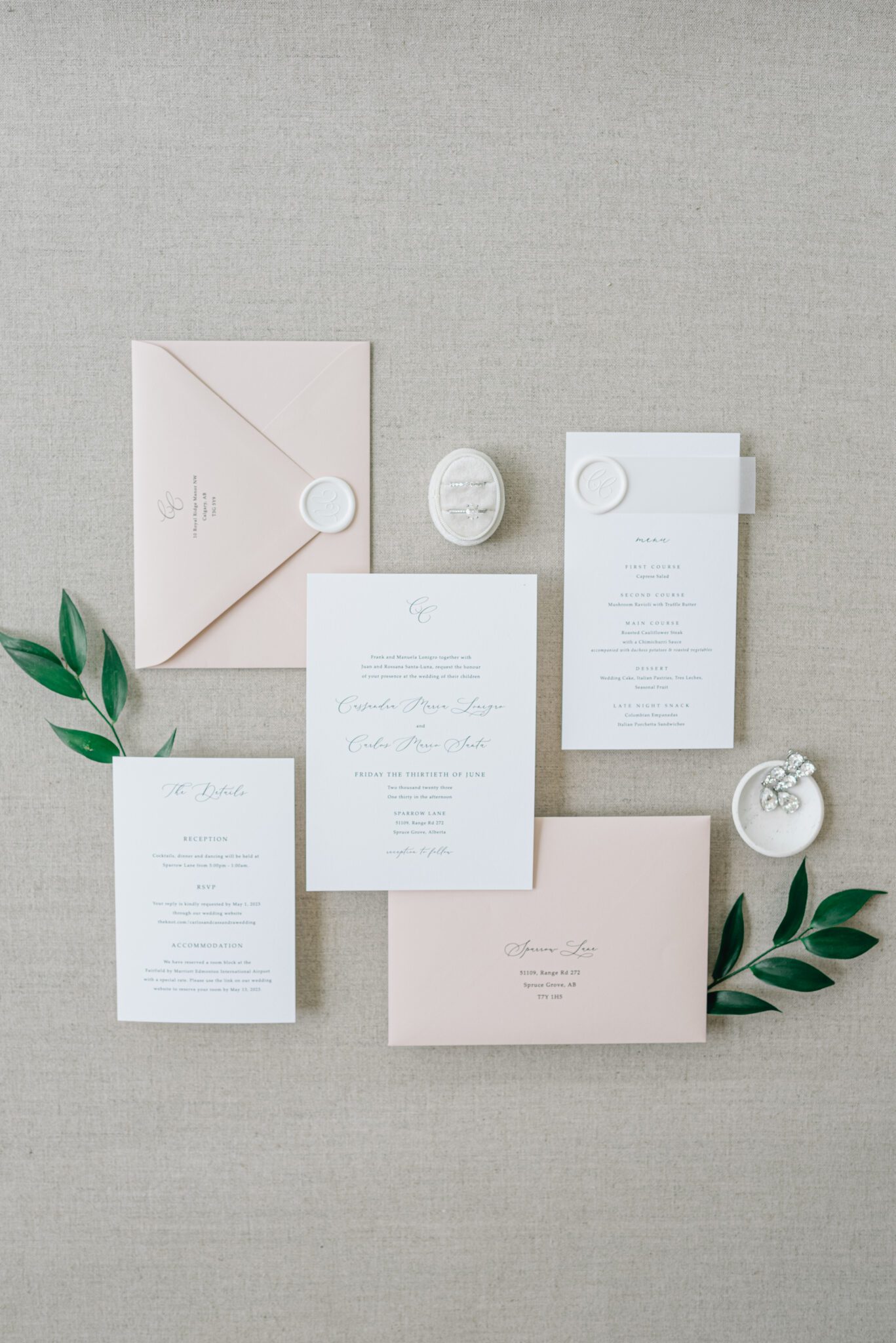 Classic and elegant white and blush wedding invitation paper suite captured by Jenny Jean Photography.
