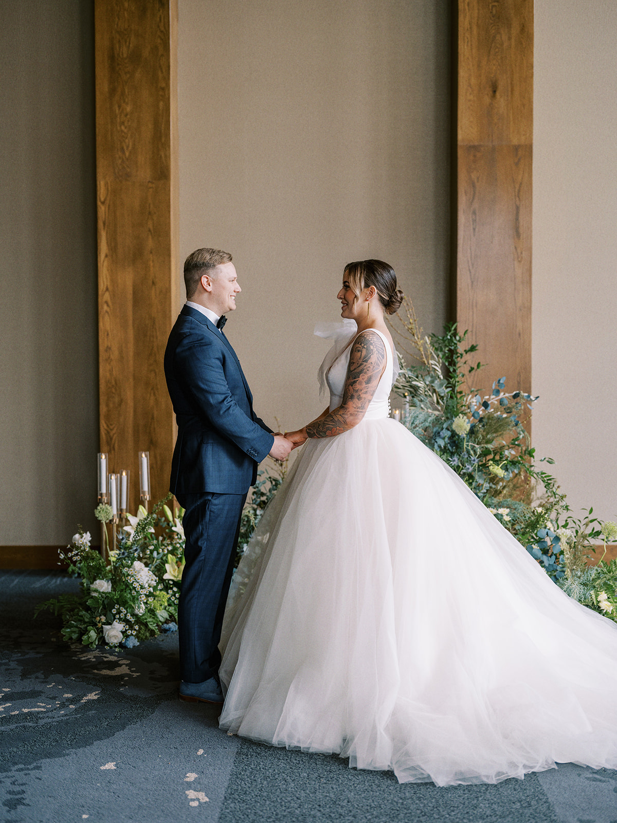 Contemporary and romantic wedding ceremony at The Malcolm Hotel in Canmore, Alberta featuring Mediterranean wedding inspiration.