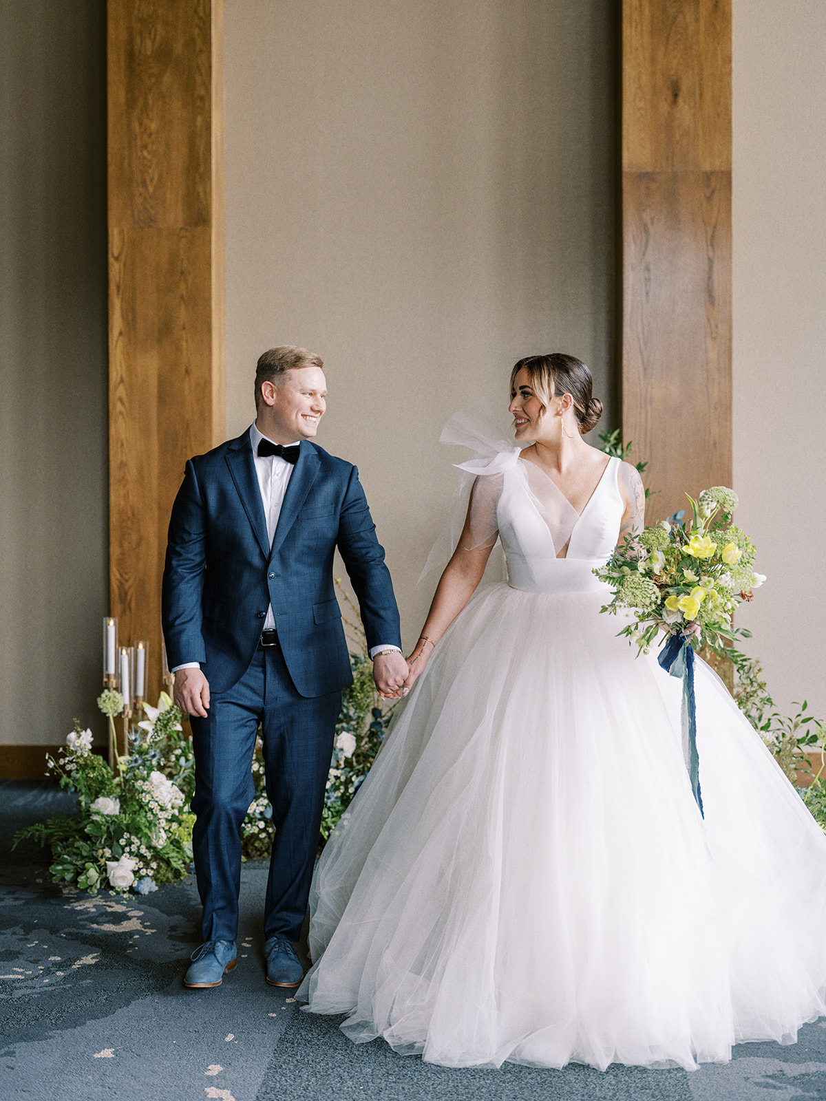 Contemporary and romantic wedding ceremony at The Malcolm Hotel in Canmore, Alberta featuring Mediterranean wedding inspiration.