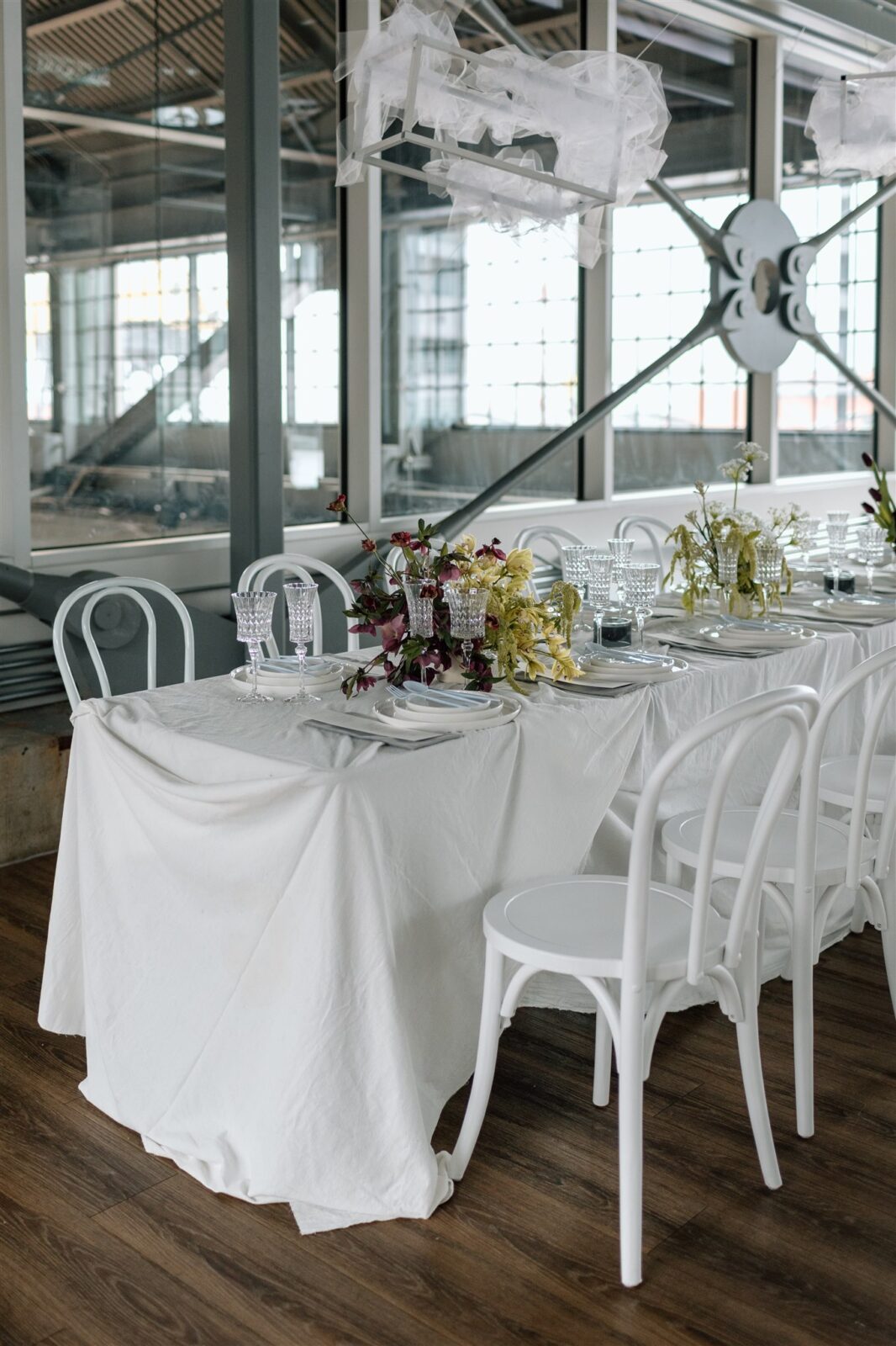 Industrial chic wedding reception at The Wallace Venue in Vancouver, BC. Sleek lines, textural accents, and high-end aesthetic. Contemporary wedding inspiration.