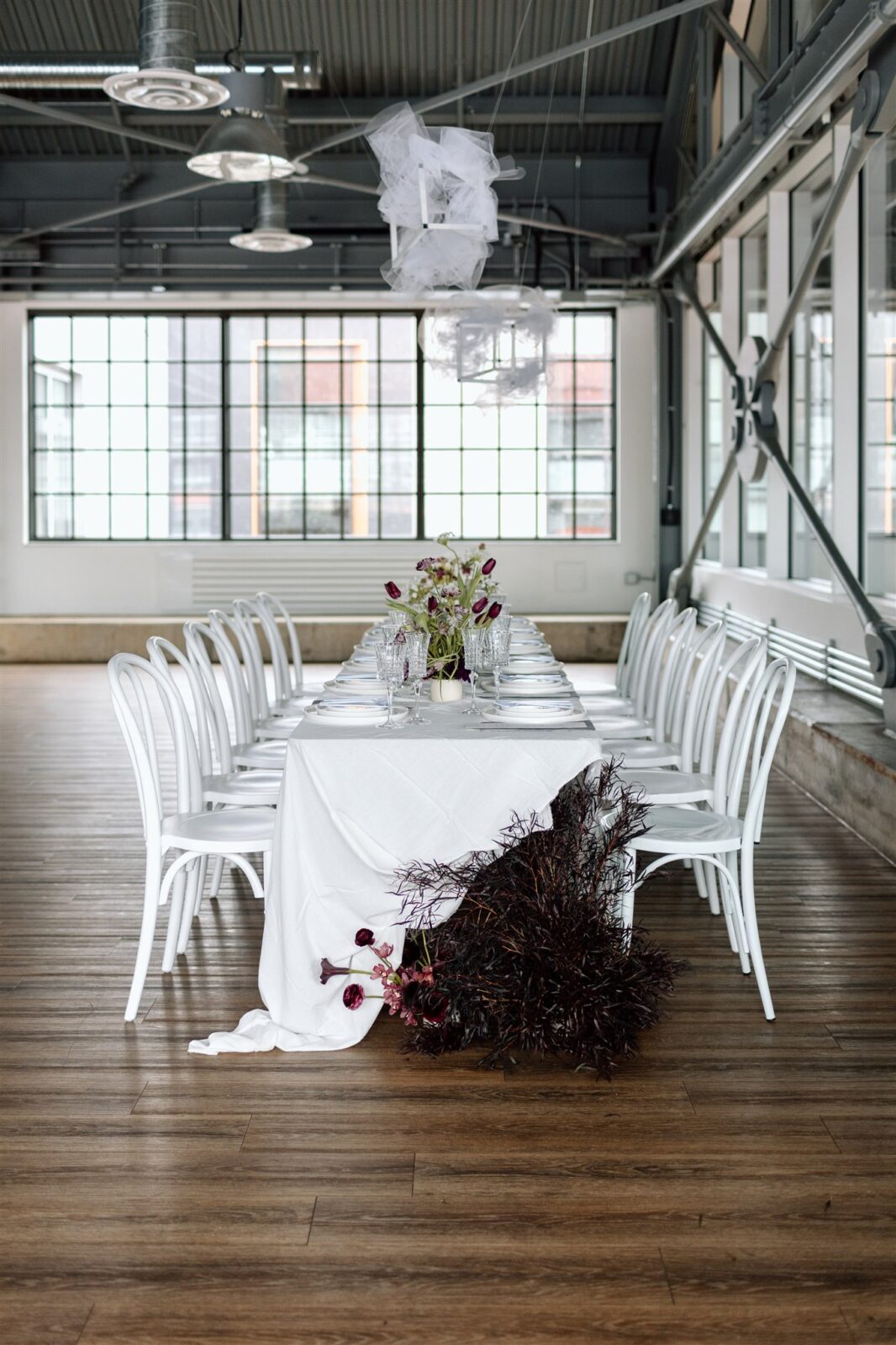 Industrial chic wedding reception at The Wallace Venue in Vancouver, BC. Sleek lines, textural accents, and high-end aesthetic. Contemporary wedding inspiration.