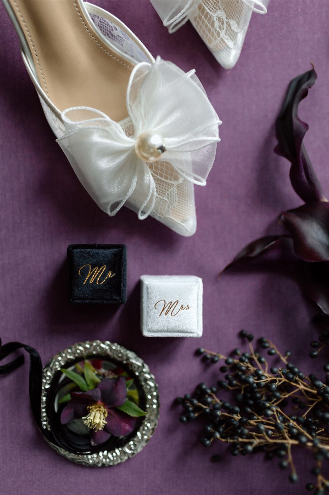 Plum inspired wedding details, featuring shoes by lace bridal shoes with pearl and cow, captured by Bronte Taylor Photography.
