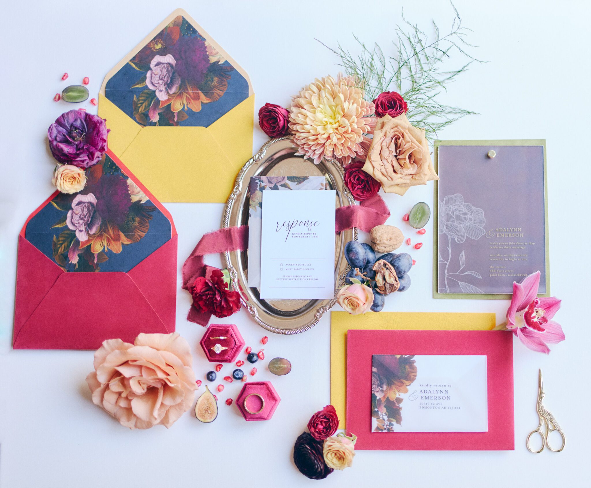 Vibrant and bold wedding inspiration. Hot pink, yellow, green and purple and wedding invitation paper suite. Hot pink velvet ring box, and gold details. 