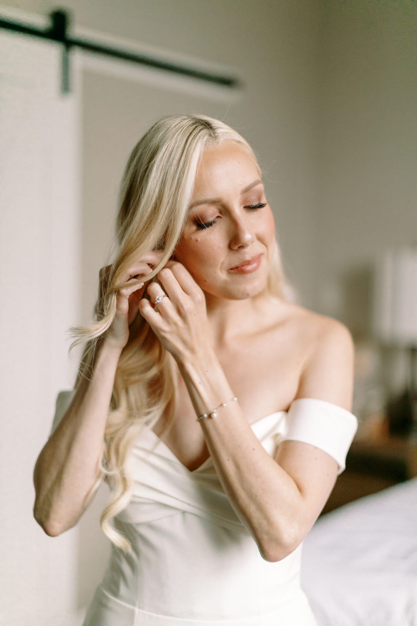 Bride getting ready for wedding day at The Malcom Hotel. Getting ready photo inspiration in Calgary, Alberta. 