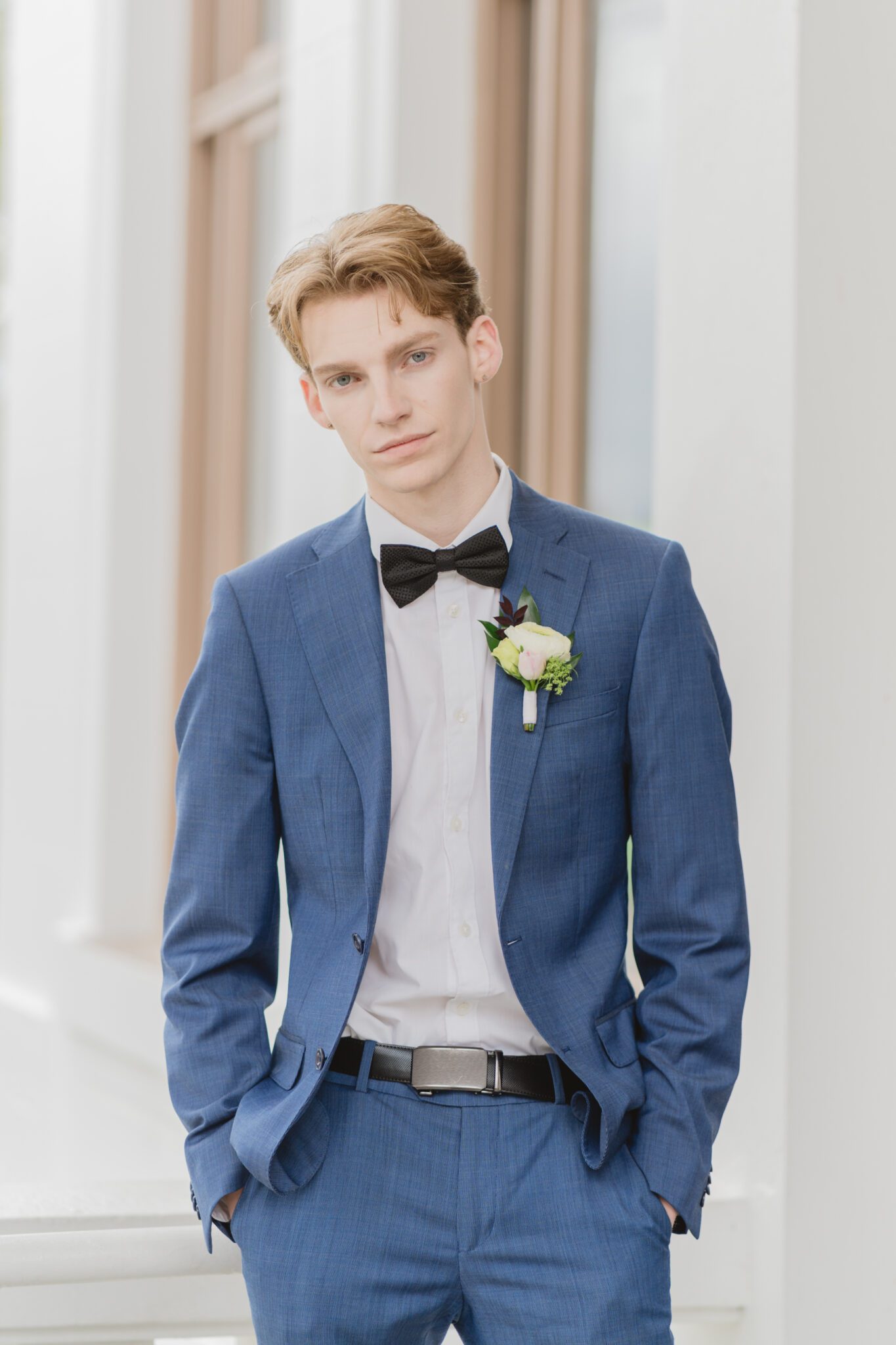 Groom during a timeless elegant wedding at Chilliwack Museum. Featuring the museum's classical architecture featuring pillars, arch windows and a grand staircase.