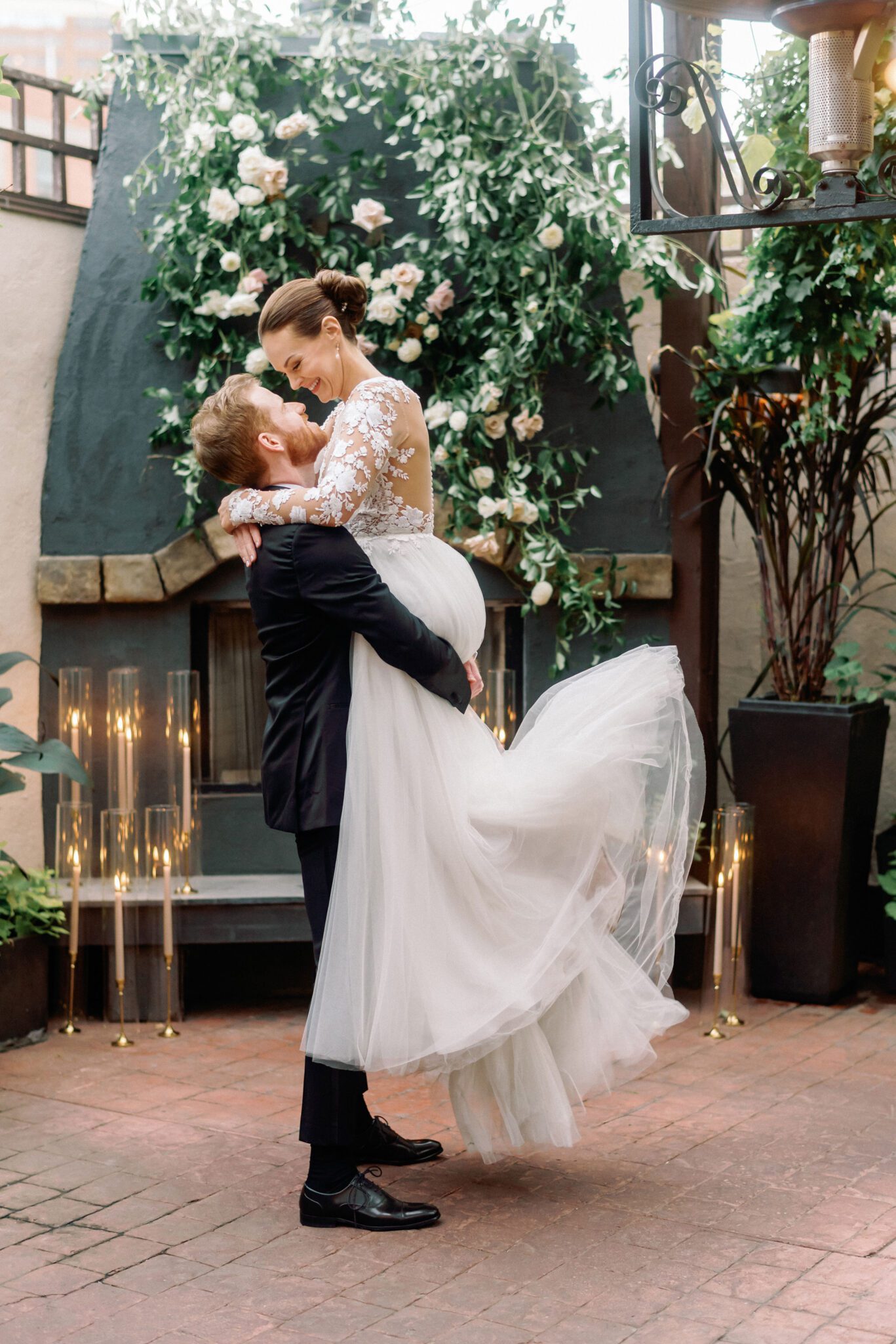 Bride and groom embrace during a romantic wedding portrait session at Bonterra Trattoria.