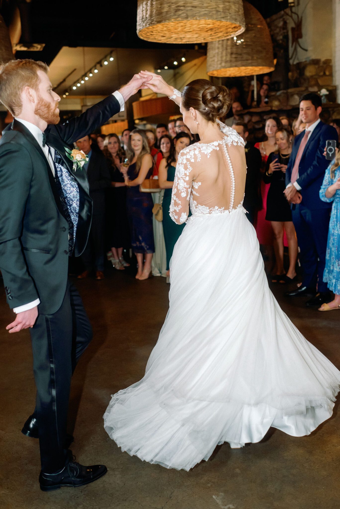 Bride and groom dance during Bonterra Trattoria wedding reception in Calgary, Alberta. 