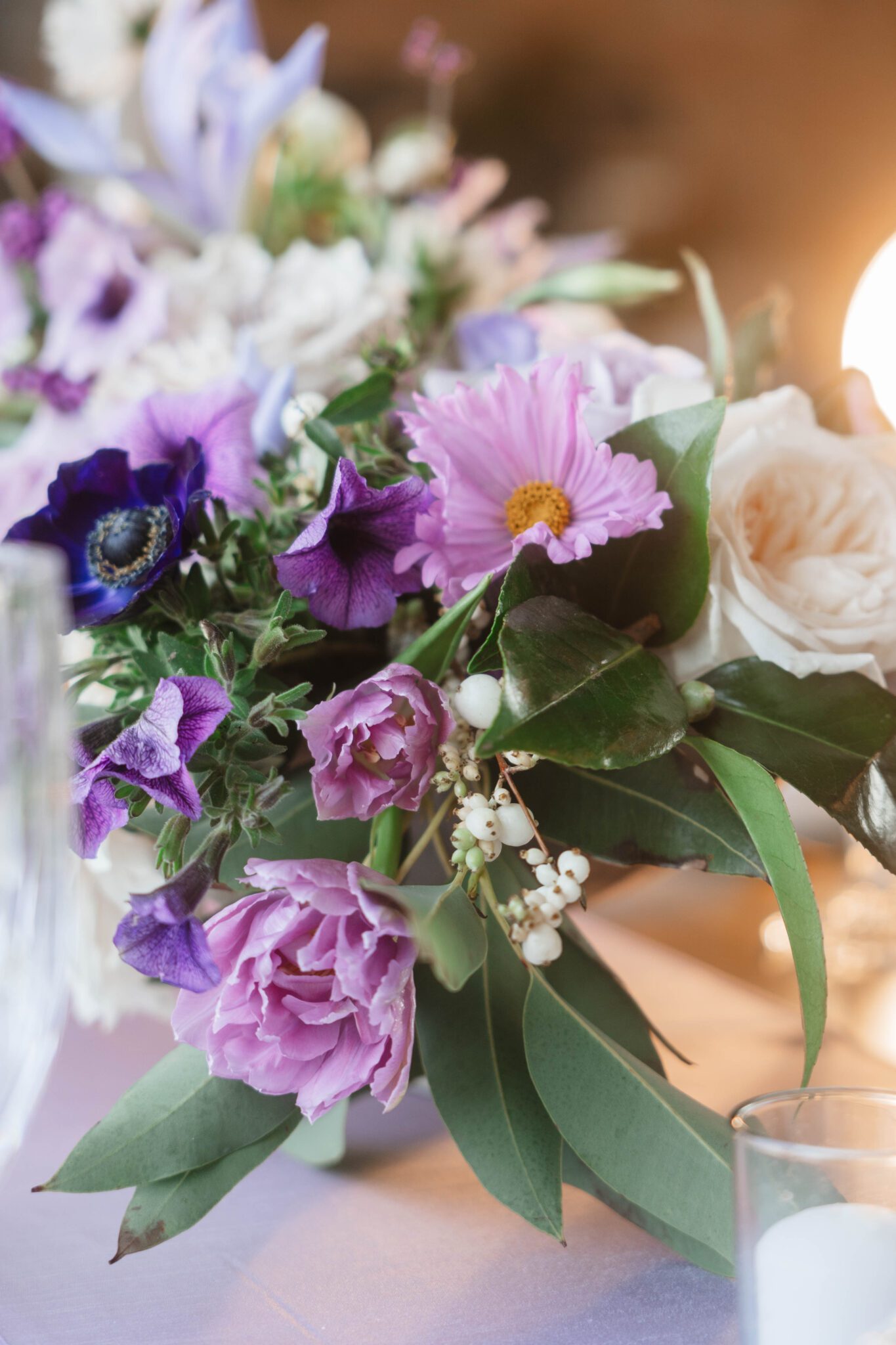 Lush purple garden party inspired wedding florals. 